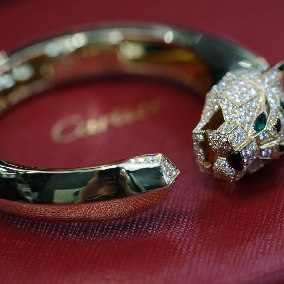 Cartier Yellow Gold Diamond Black Onyx Panthère Cuff Bracelet In Excellent Condition In New York, NY