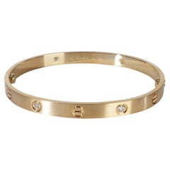 Bracciale Love Cartier in oro giallo con diamanti e finitura spazzolata
