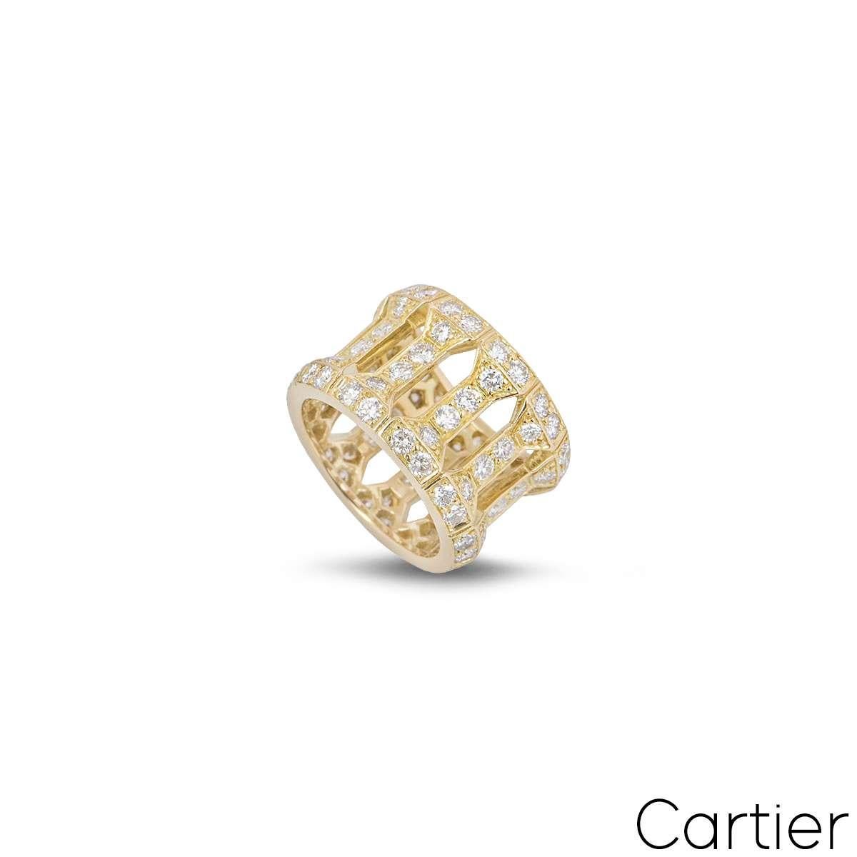 A stunning yellow gold diamond dress ring by Cartier. The ring is formed of 11 pillar style links, each set with 8 round brilliant cut diamonds. There are 88 diamonds in total with an approximate carat weight of 3.52ct, predominantly G colour and VS
