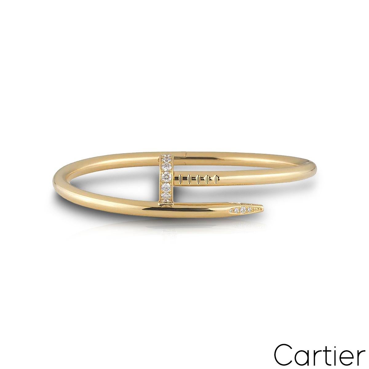 An 18k yellow gold Cartier diamond bracelet from the Juste Un Clou collection. The bracelet is in the style of a nail and has 27 round brilliant cut pave diamonds set in the head and tip, totaling 0.54ct. The diamonds are predominantly F colour and