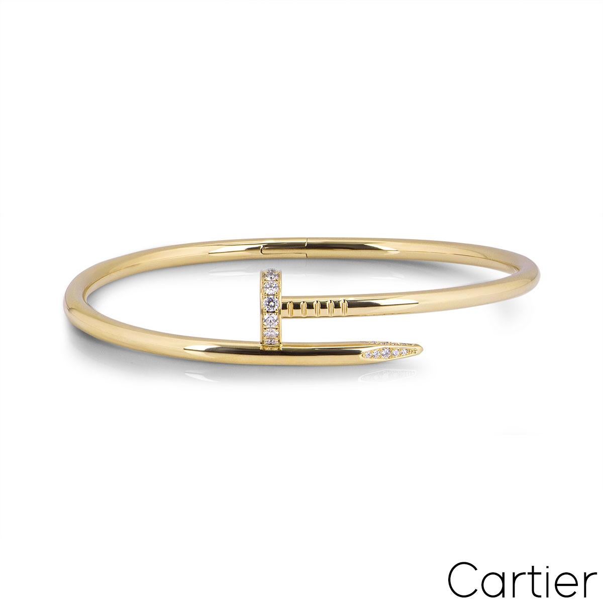A stunning 18k yellow gold Cartier diamond bracelet from the Juste Un Clou collection. The bracelet is in the style of a nail and has 32 round brilliant cut diamonds pave set in the head and tip, totalling 0.58ct. The diamonds are predominantly F