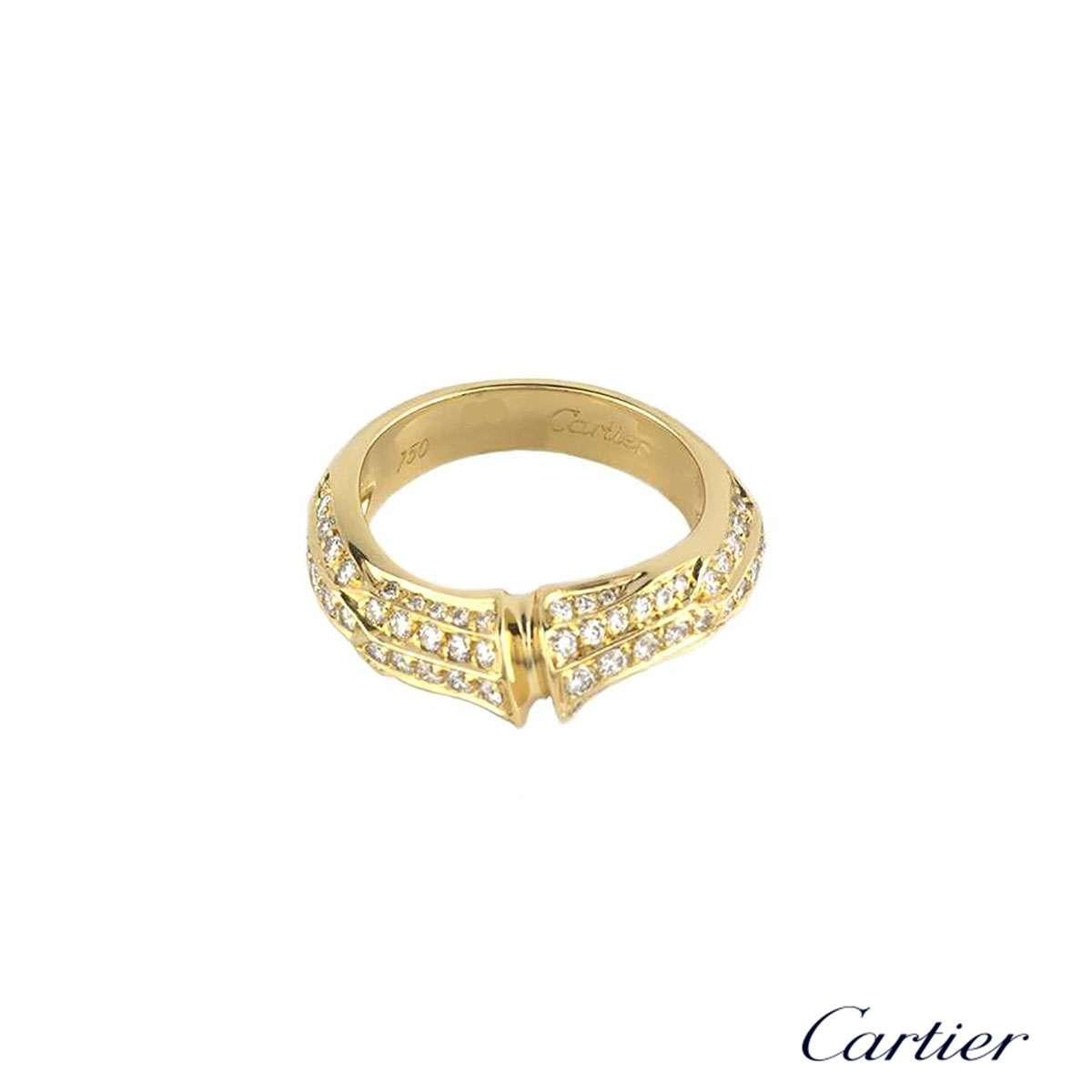 A stylish 18k yellow gold diamond set ring from the Cartier Bamboo collection. The ring is set to the front with a bamboo design, pave set with round brilliant cut diamonds totalling approximately 0.82ct, and is complemented by a brushed finish to