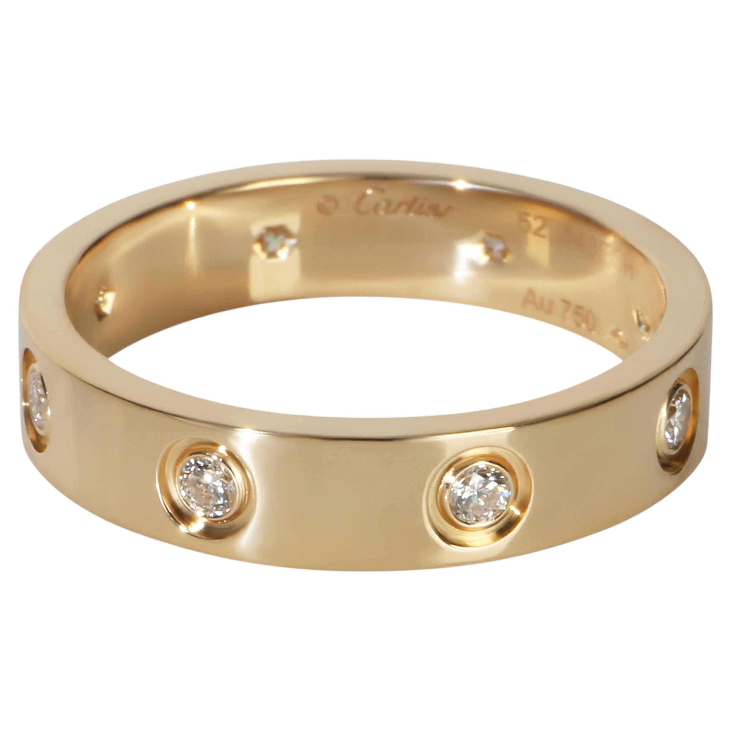 Bague Love en or jaune à diamants et petit modèle de Cartier