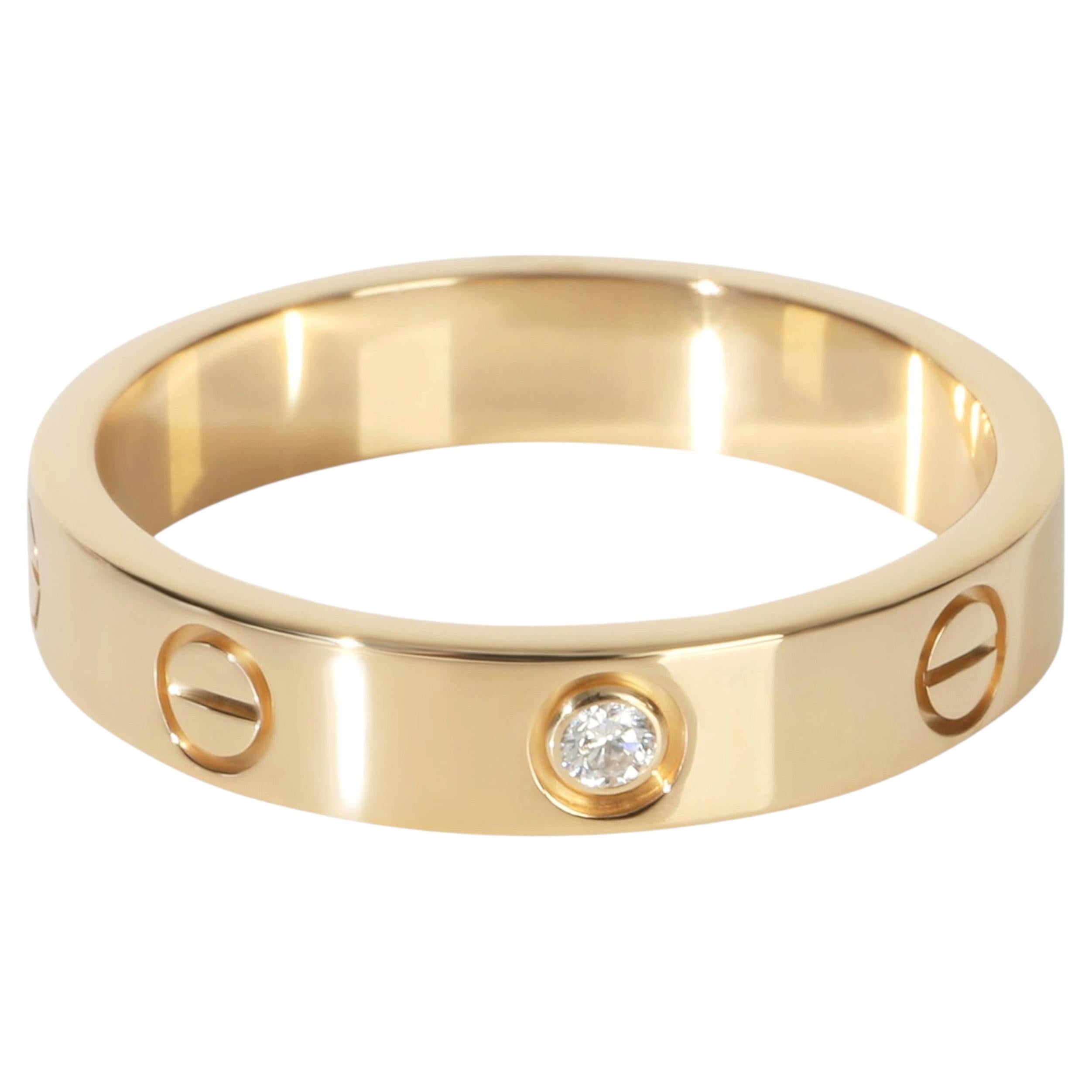 Bague Love en or jaune à diamants et petit modèle de Cartier