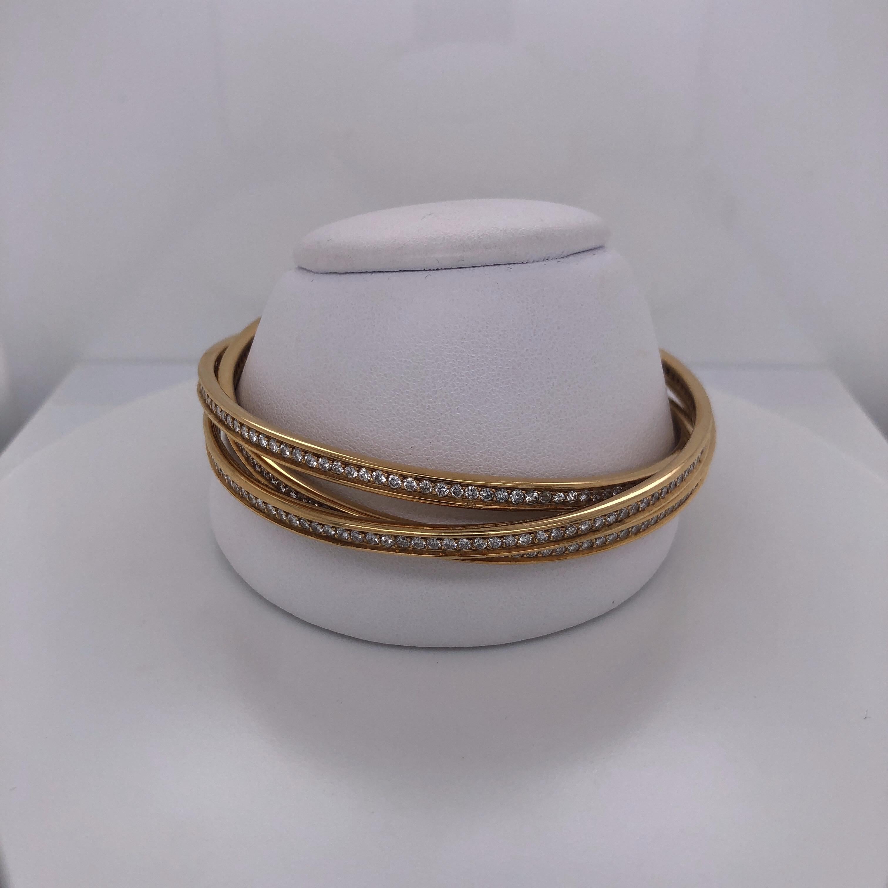 Cartier Yellow Gold Diamond Trinity Bangles In Good Condition For Sale In Dallas, TX