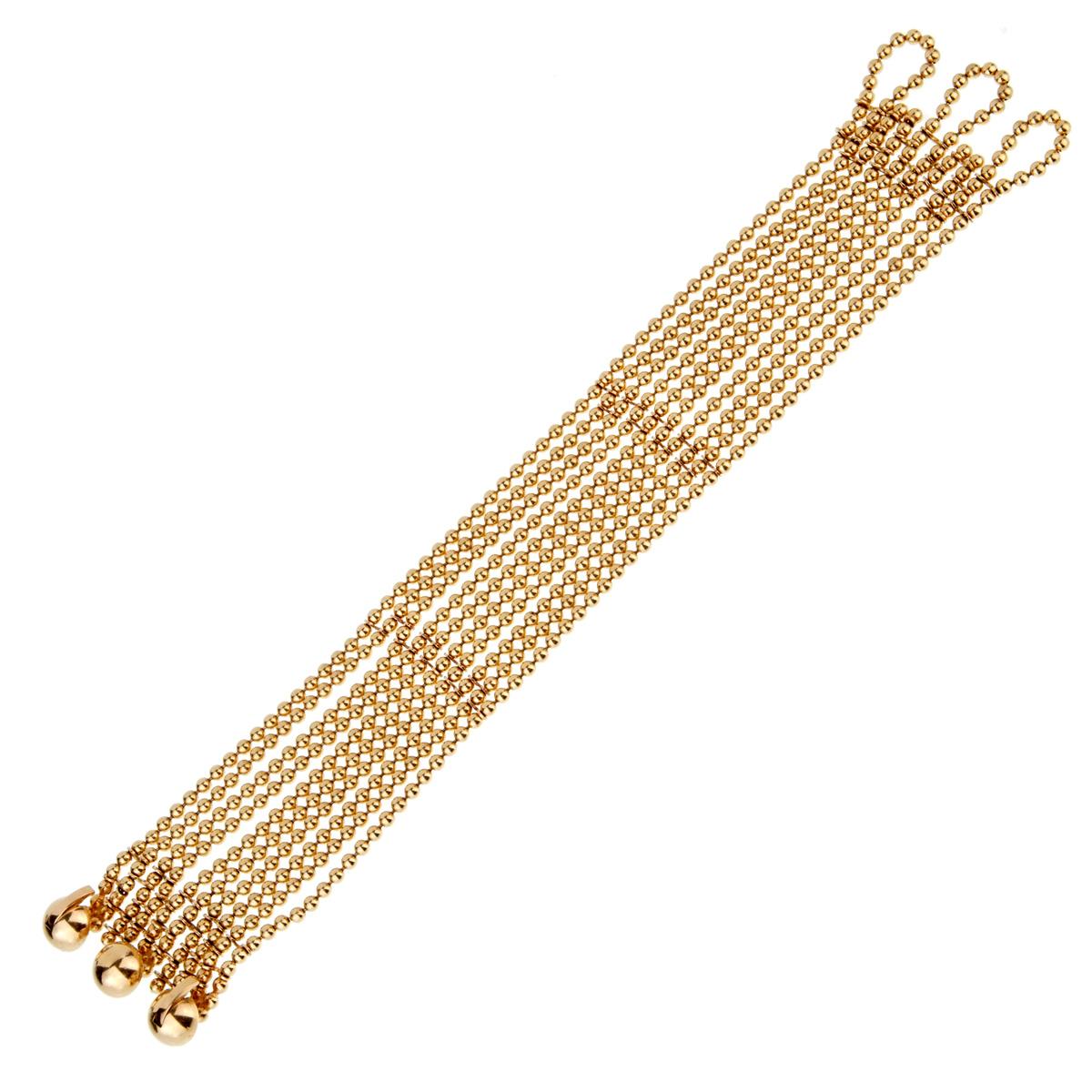 A wonderful classic Cartier bracelet circa 1990's featuring a beaded design in 18k yellow gold, the bracelet is finished with 3 beaded  hooks for extra security when worn. The bracelet measures 6.5