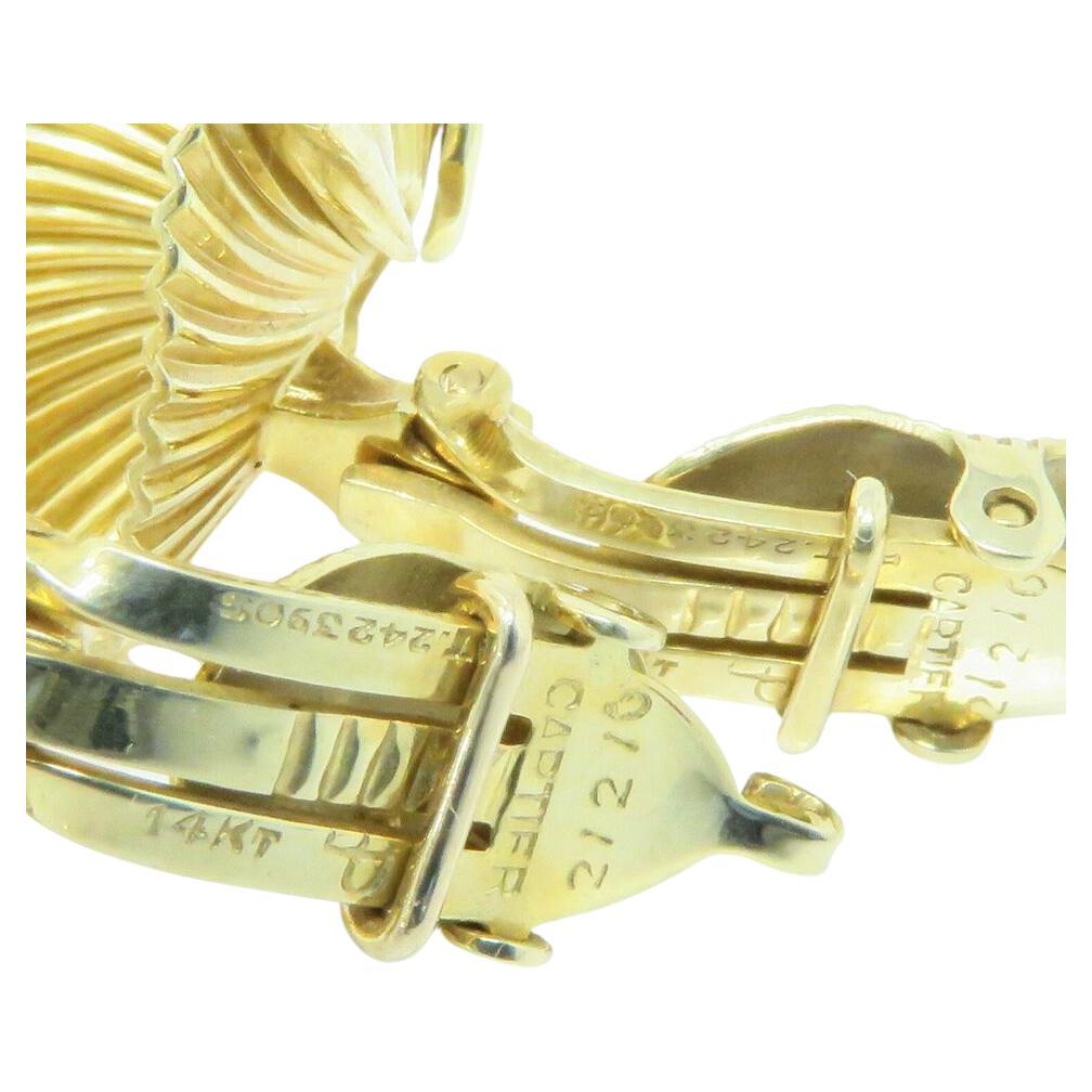 Cartier Vintage Yellow Gold Earrings
Marked: Cartier 14k 21210 PAT 2423905
Earrings are about 21 x 18mm
Total Weight: 9.3 grams
