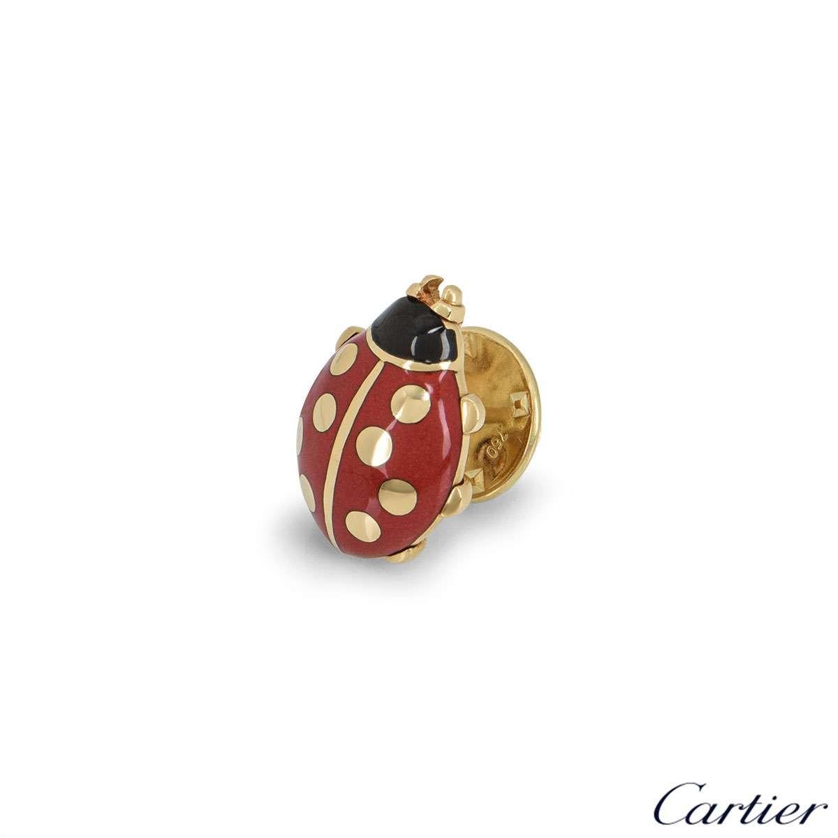 A unique 18k yellow gold Ladybird pin by Cartier. The Ladybird features red and black enamel with yellow gold spots. The pin measures approximately 1.5cm in length, has a clasp closure and has a gross weight of 4.6 grams.

The pin comes complete