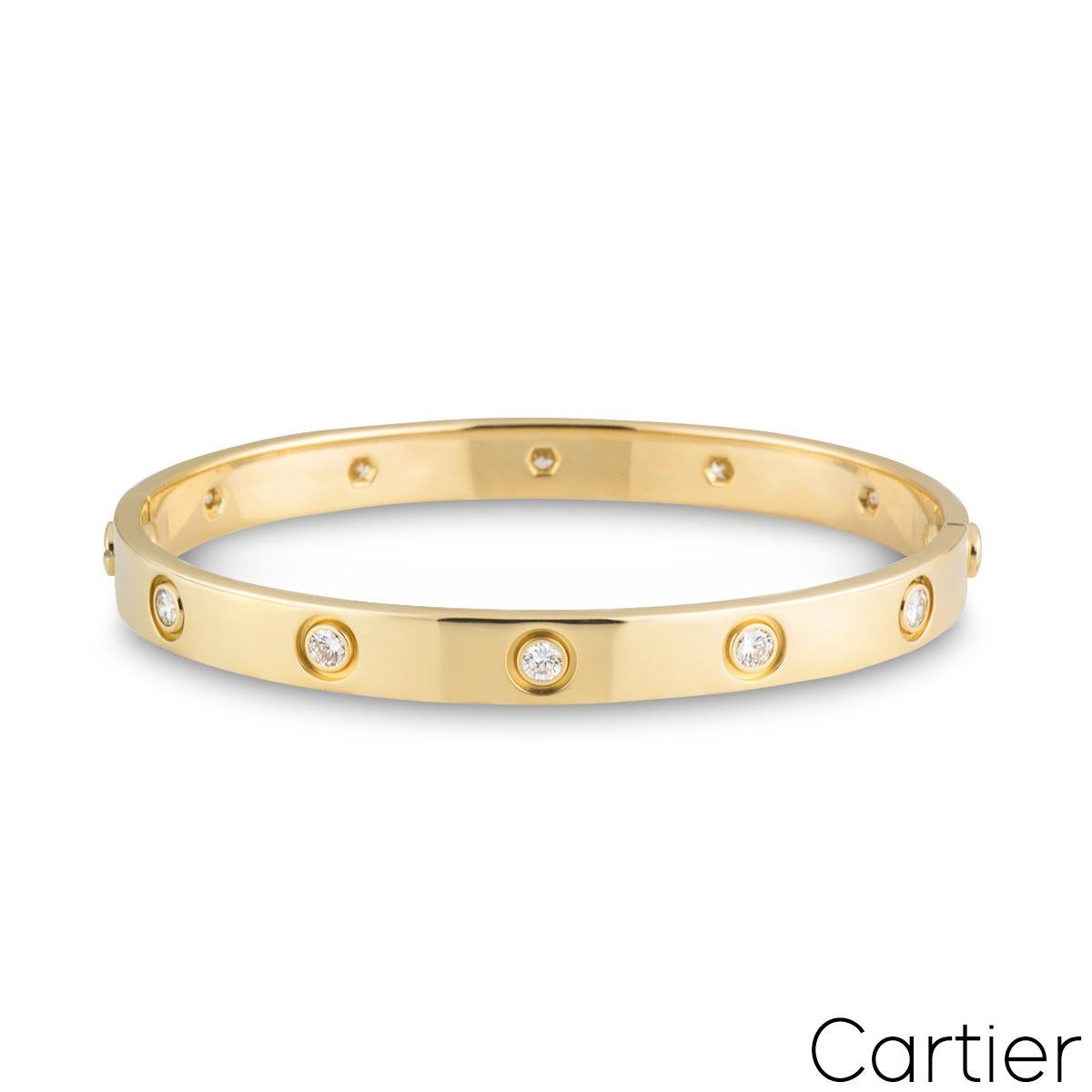An iconic 18k yellow gold full diamond bracelet by Cartier from the Love collection. The bracelet is set with 10 round brilliant cut diamonds in a rubover setting circulating the outer edge throughout totalling 0.96ct. The bracelet is a size 16 and