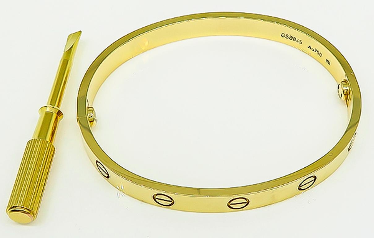 This classic Cartier 18k yellow gold love bangle has a width of 6mm and it weighs 33 grams. The size of the bangle is size 17. It is signed Cartier 17 GSB845 Au750.


Inventory #17539WKSS