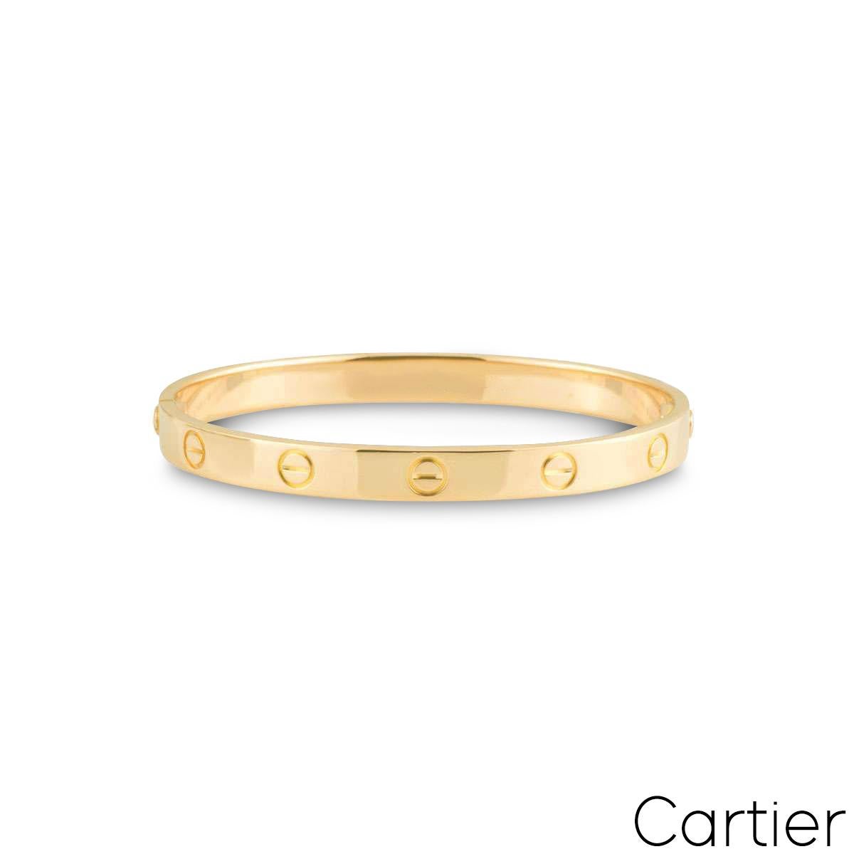 An 18k yellow gold Cartier bracelet from the Love collection. The bracelet has the screw motif displayed around the outer edge and features the new style screw fitting. This bracelet is a size 19 and has a gross weight 36.6 grams. 

Comes complete