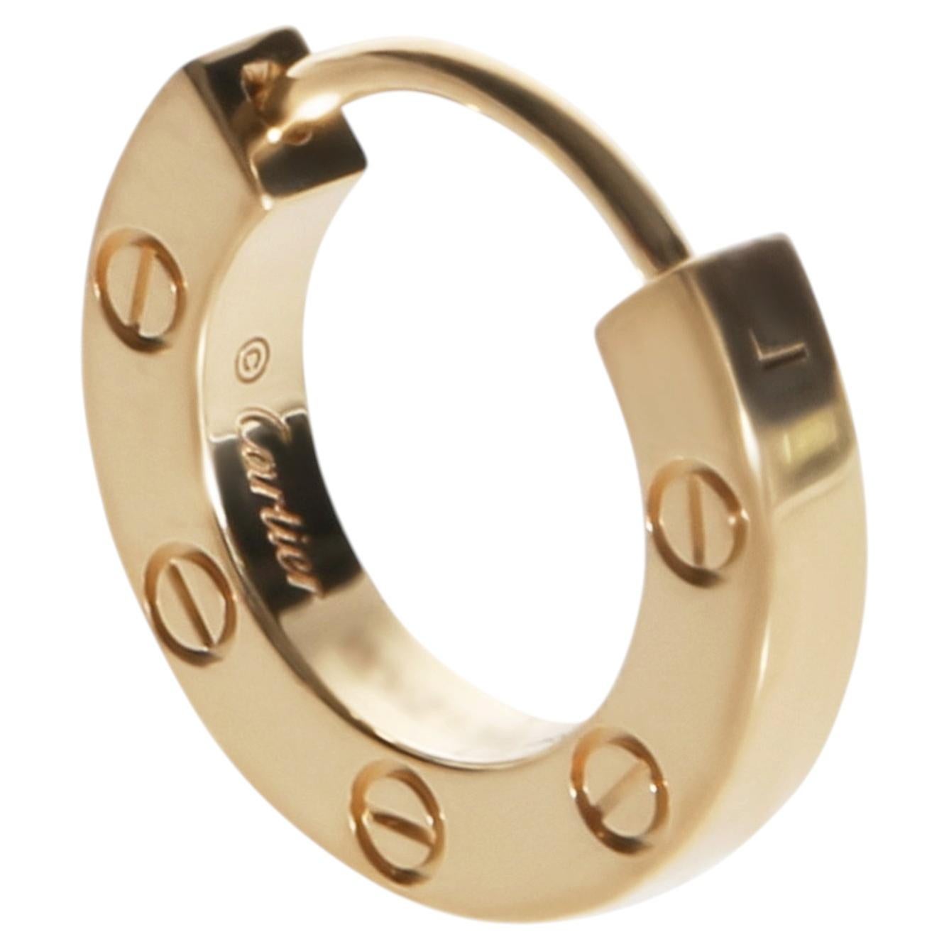 How do you open Cartier Love earrings?