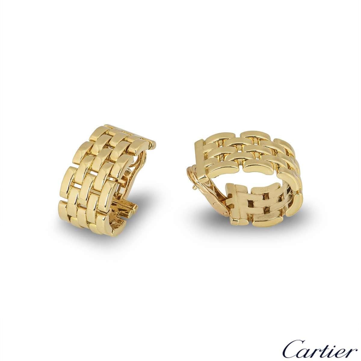 A pair of 18k yellow gold earrings from the Maillon Panthere collection by Cartier. The earrings are composed of five rows of iconic flat links in a half hoop design. The earrings measure 1.2cm in width and 2.5cm in length. The earrings feature post