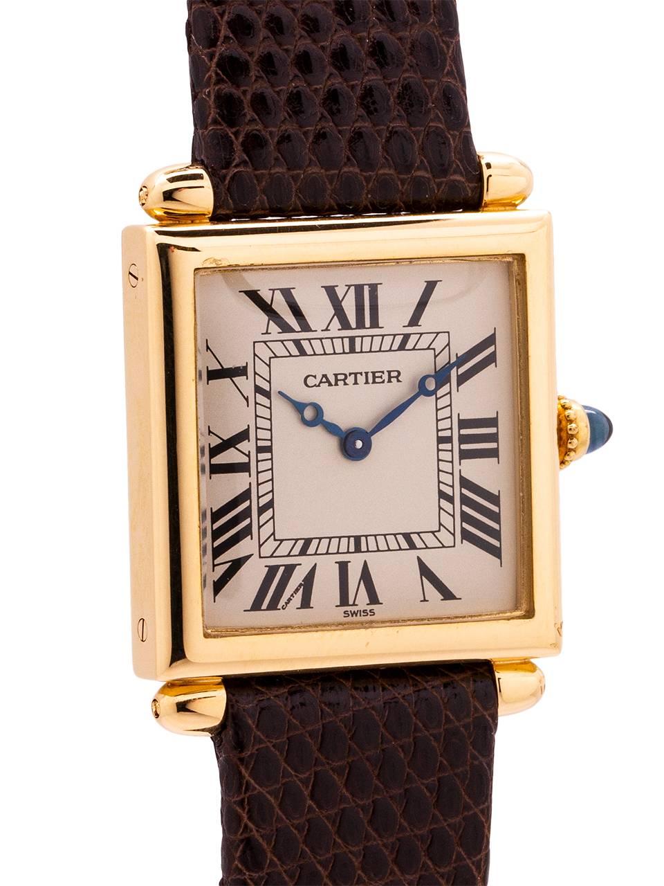 
Cartier man’s medium size 18K YG Obus model featuring a 24 x 31mm case with bullet shaped lugs, with silvered dial with classic bold Roman figures, blued steel moon style hands. Battery powered quartz movement. With generic genuine brown lizard
