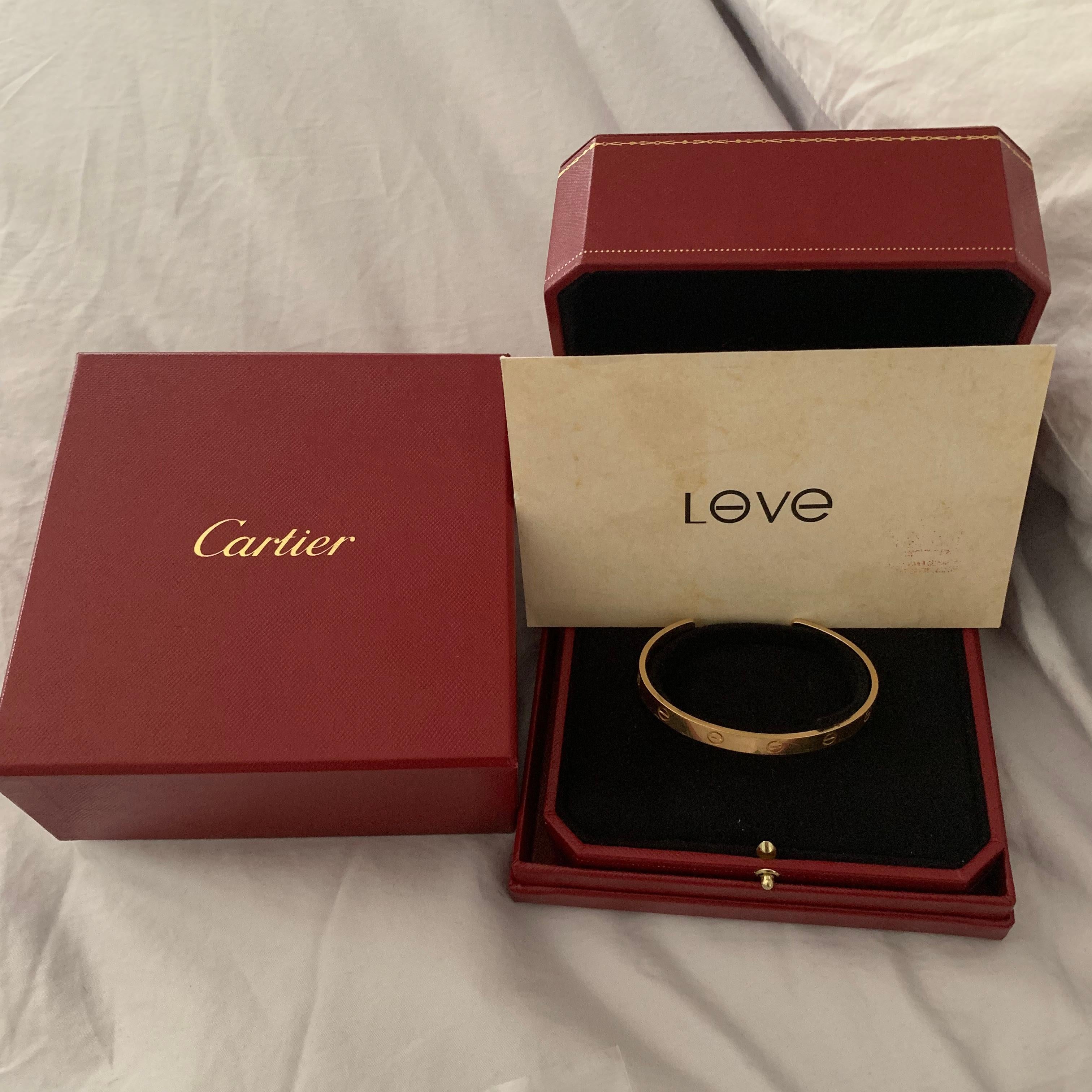 We take trades for certain diamonds , watches, and designer jewelry.

Cartier Yellow Gold Open Cuff Love Bracelet 2018 Box and Papers Size 19

This Bracelet is in Mint condition.

Comes With Box and Papers

Guaranteed Authentic Cartier
