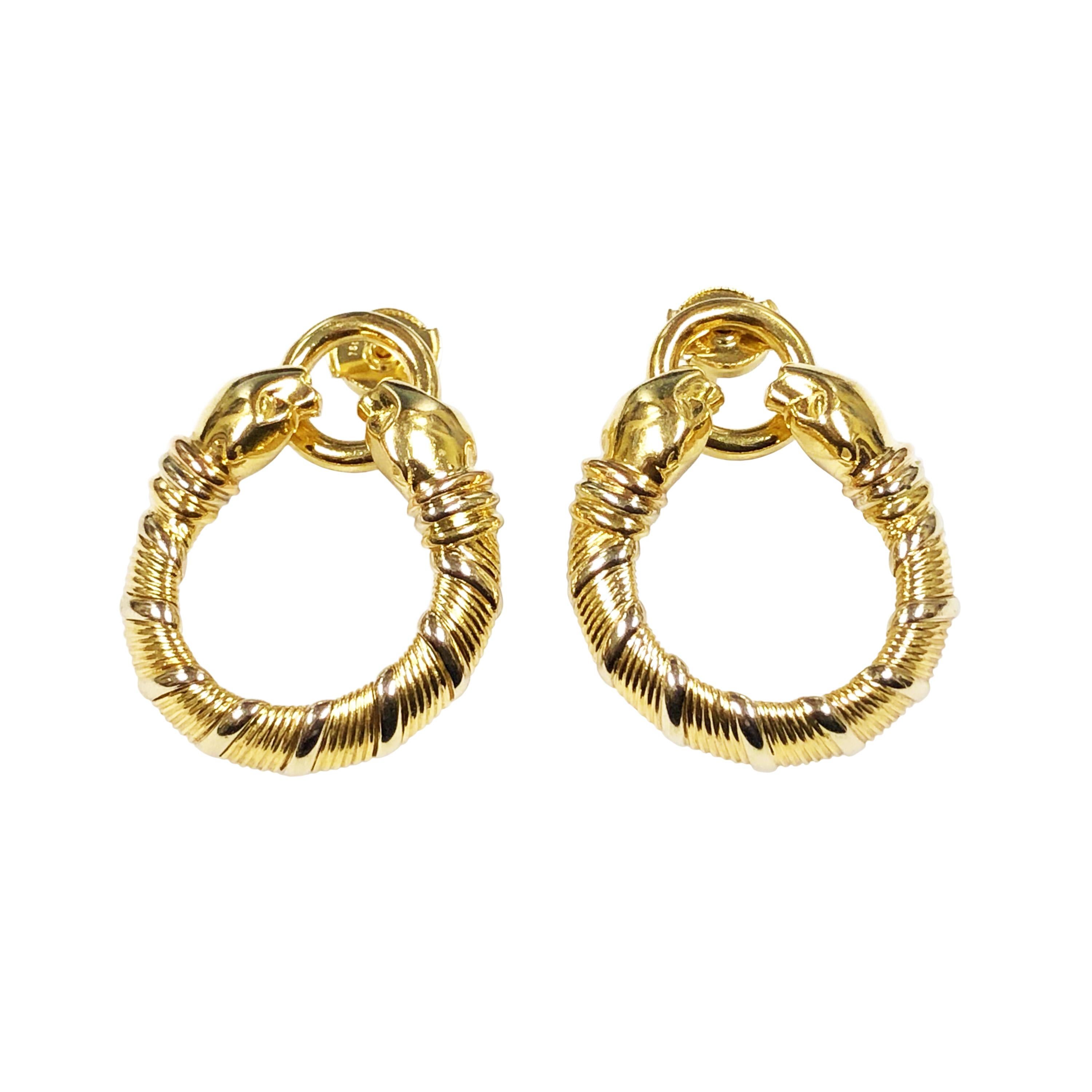 Circa 2000 Cartier Panther collection 18K Yellow Gold Hoop Earrings, measuring 1 3/8 inch in length and 1 1/8 inch in diameter. Having  Posts with Pressure fit backs. 