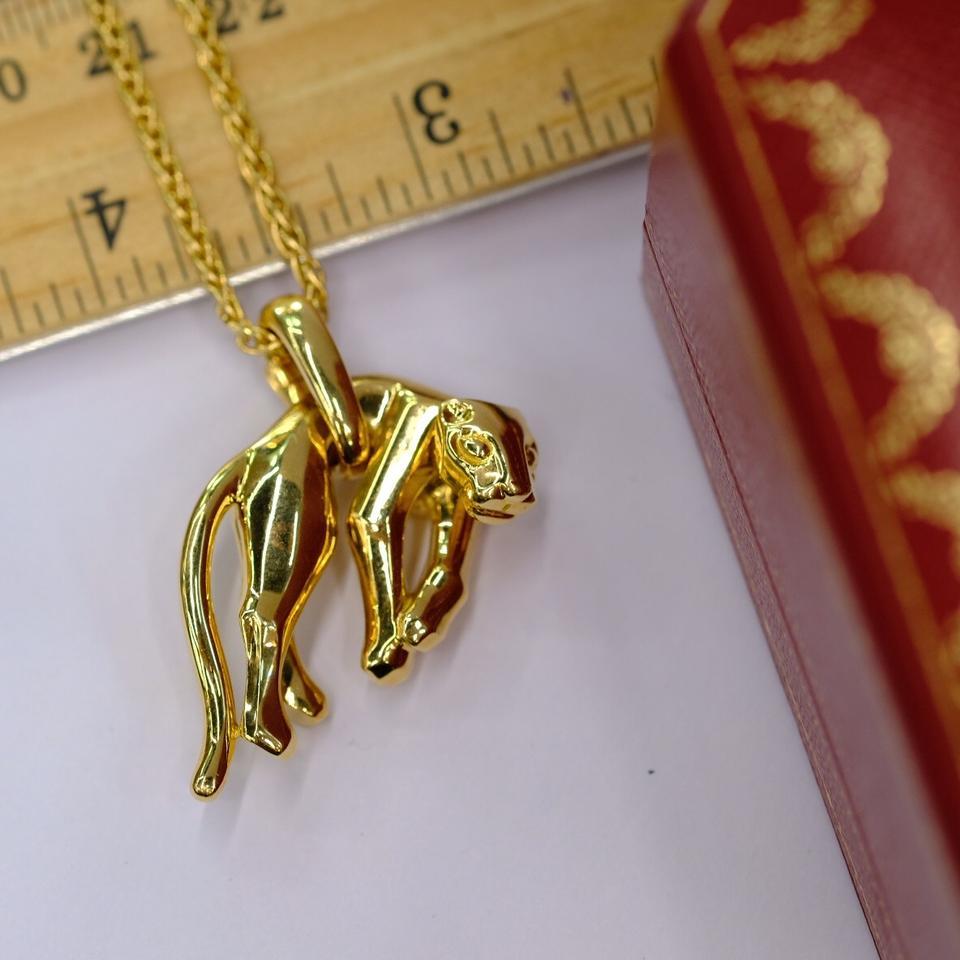 Taille Marquise Cartier, collier pendentif Panthère en or jaune 18 carats avec chaîne