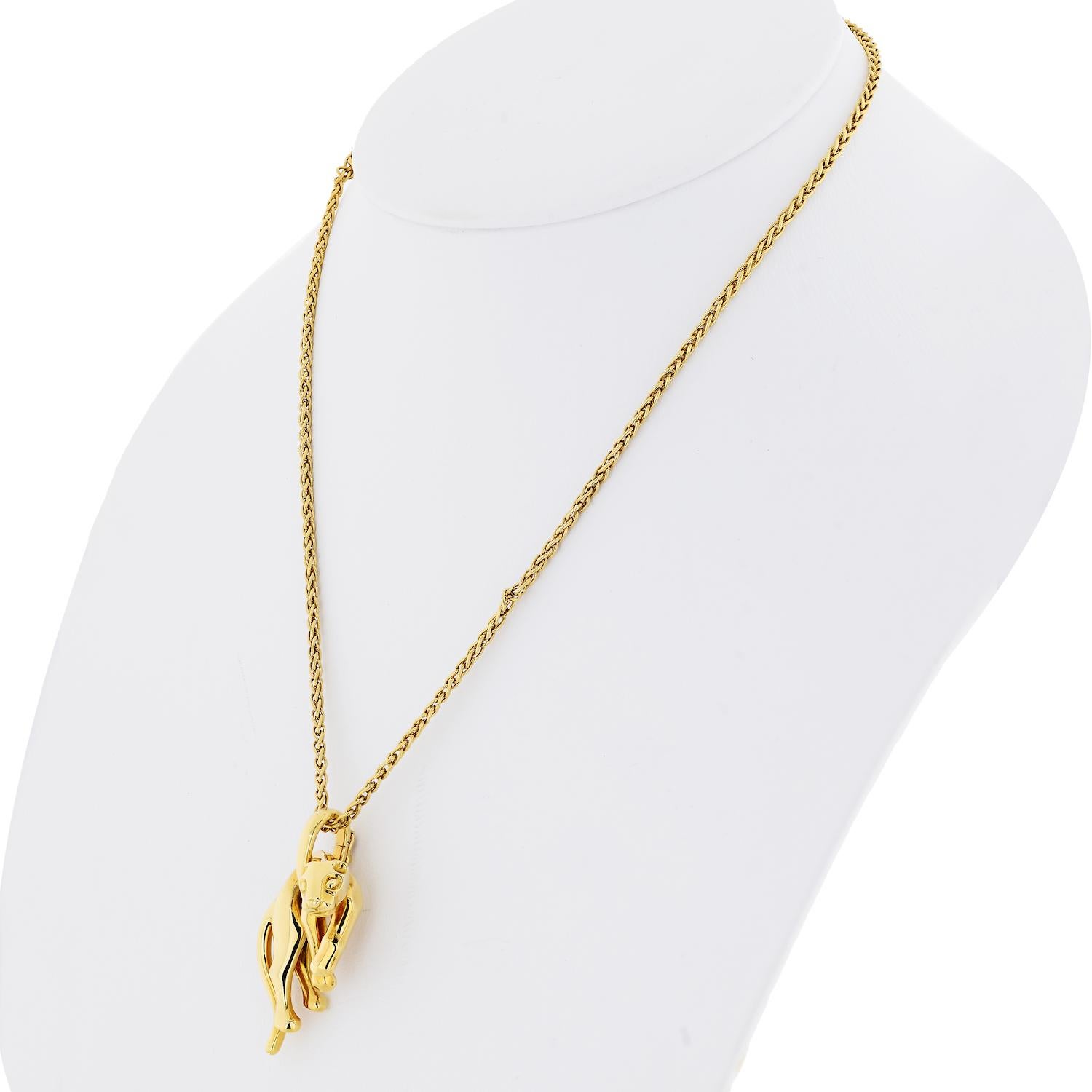 Cartier 18K Yellow gold Panthere pendant on a chain.

Gorgeous 18k yellow gold panthere is an exemplary representative of the house of Cartier. It is in impeccable condition. It is a very rare highly collectible piece! 
The pendant is fully marked