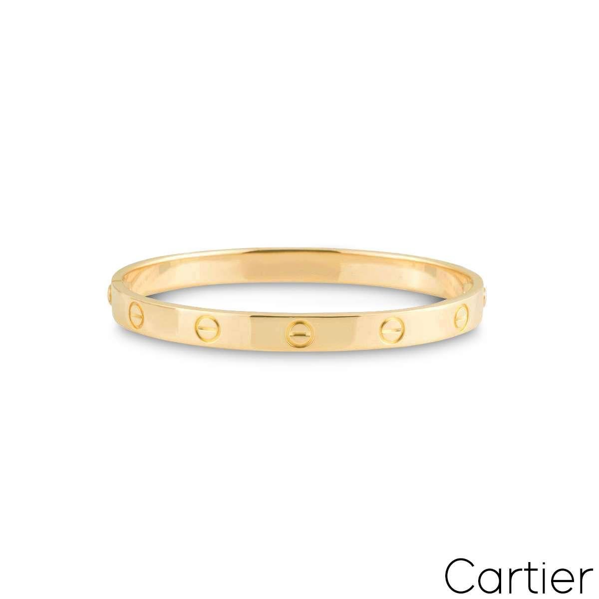 An iconic 18k yellow gold Cartier bracelet, from the Love collection. Featuring Cartier's signature screw motif design, this bracelet is fitted with the new style screw fitting. Weighing 34.9 grams, the bracelet is a size 18.

Comes complete with
