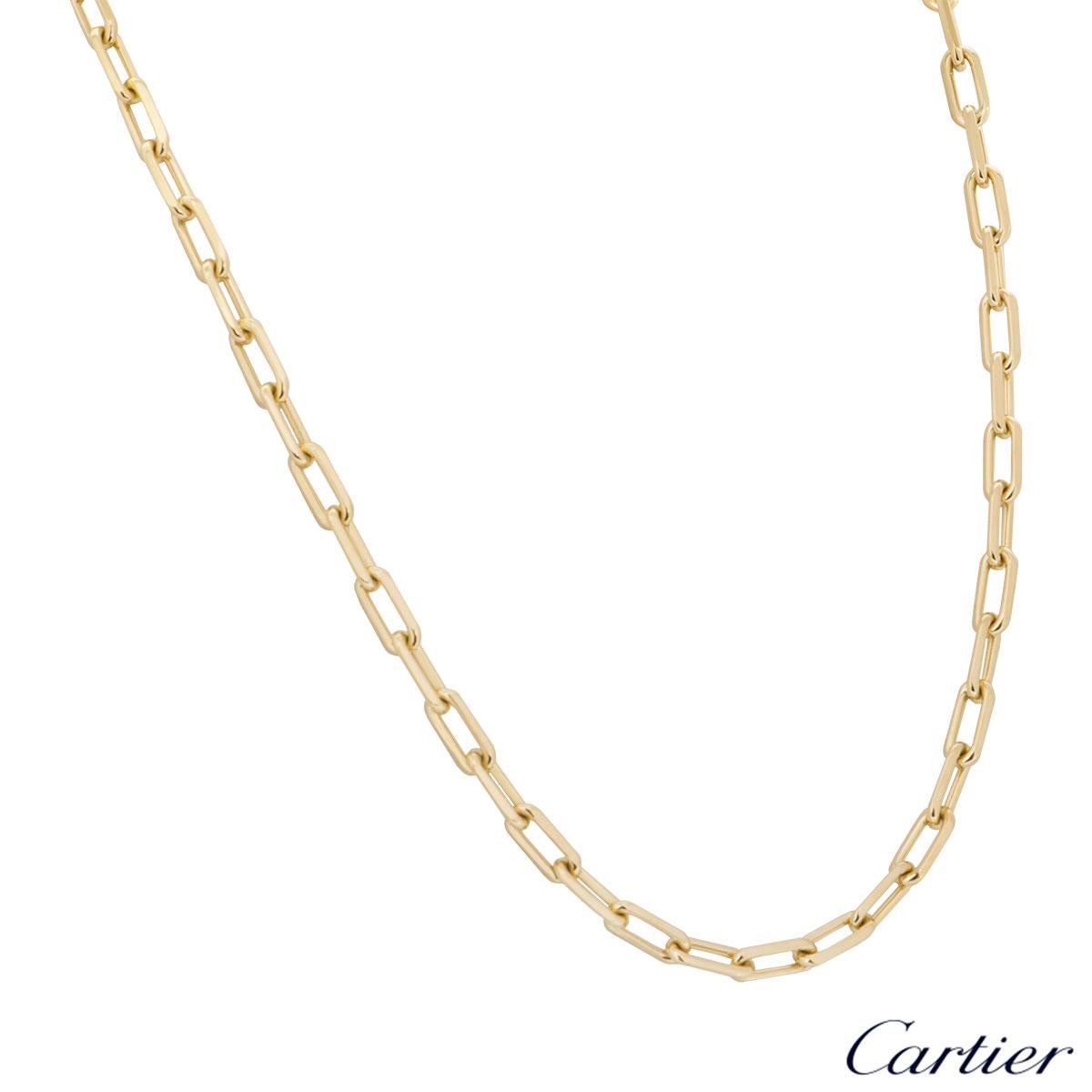 An 18k yellow gold necklace by Cartier from the Santos De Cartier collection. The necklace features an elongated cable chain set with a lobster clasp. The necklace has a length of 22.00 inches and has a gross weight of 55.20 grams. 

The necklace