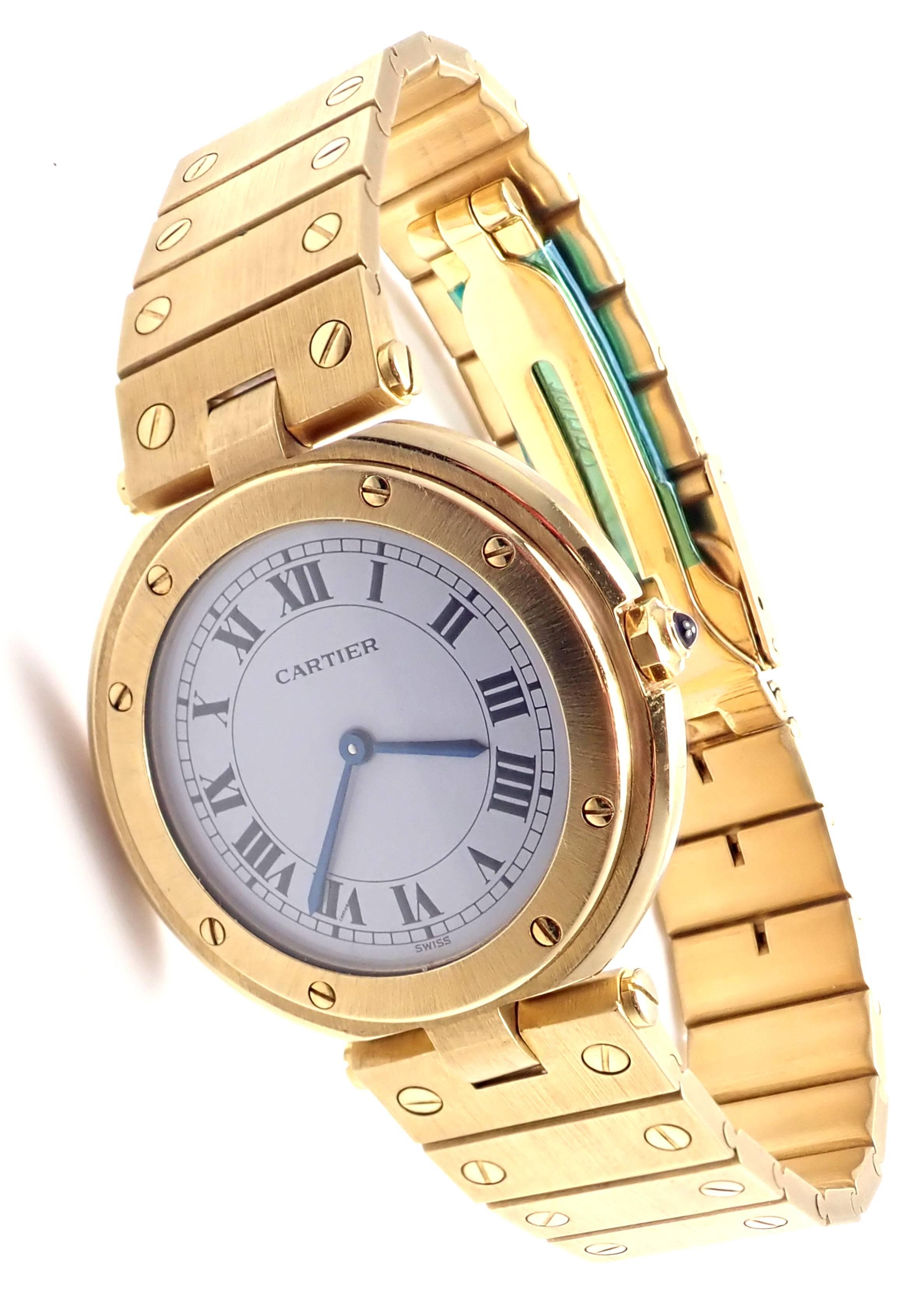18k yellow gold Santos De Cartier Unisex Quartz Watch. 
Details: 
Case Dimensions: 32mm
Watch Length: 7.5