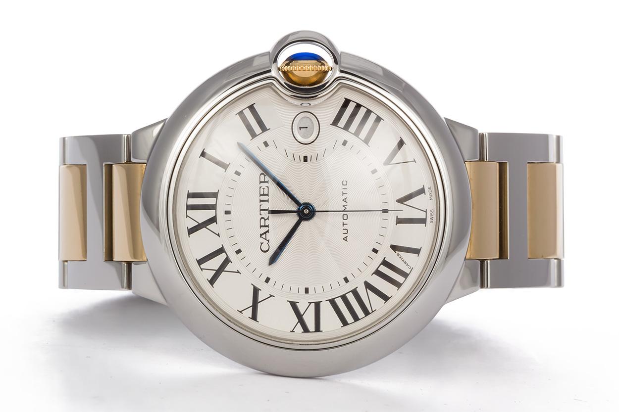 We are pleased to offer this Authentic Cartier 18k Yellow Gold & Steel Ballon Bleu Automatic Watch. This watch features a 42mm case and beautiful silvered roman dial. This watch will fit up to a 7