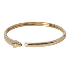 Cartier Gelbgold Tsavorit und Onyx kleines Modell Panthere de Cartier Armband