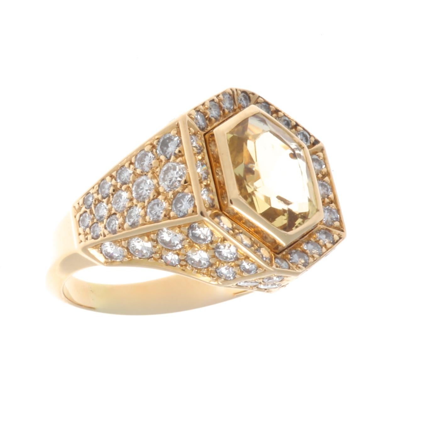 Cartier's never ending journey of excellence. Featuring an approximately 3.50 carat no heat yellow Ceylon sapphire that is crowned by a tiara of diamonds. Crafted in 18k yellow gold. Signed Cartier and numbered. Ring size 6-1/4 and can easily be