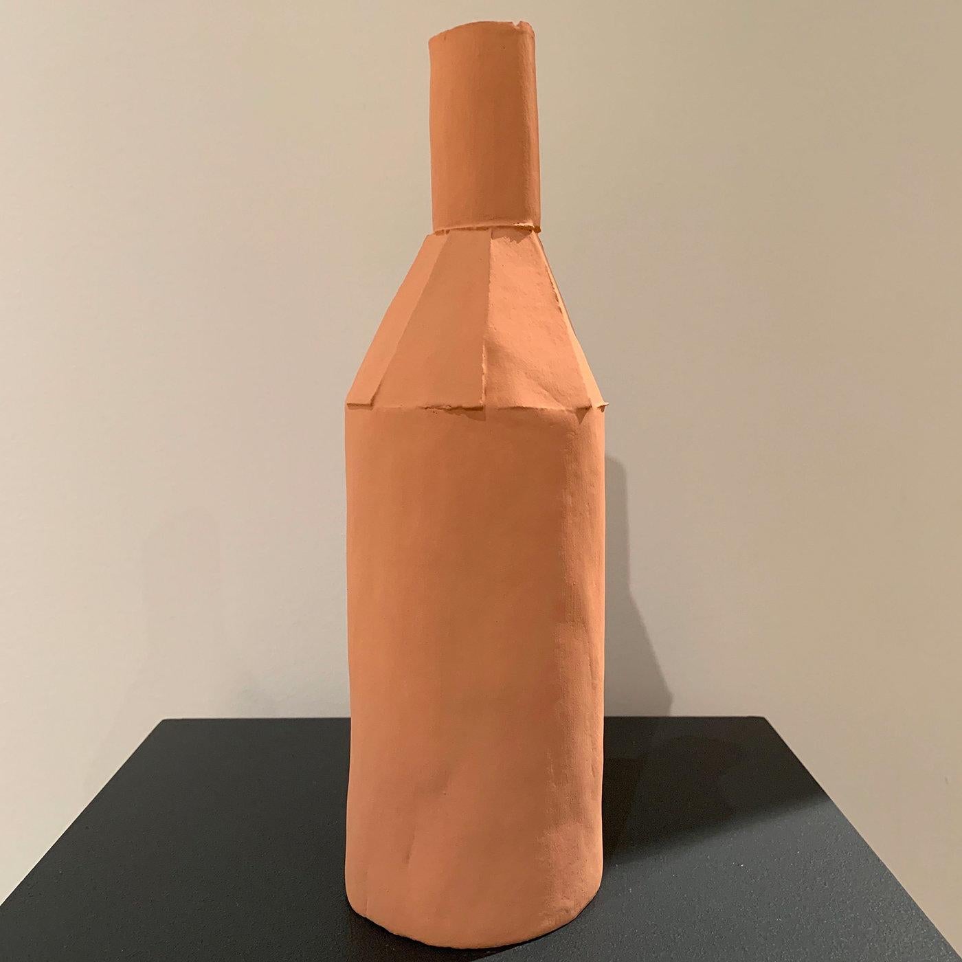 Elegantly shaped like a bottle with an irregular silhouette and a paper-like surface, this superb bottle has a delicate pink hue that gives it a dream-like allure. This piece is crafted by hand using a complex method, creating a unique work of art