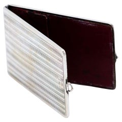 Cartoneira - silver wallet with guilloche bands along the length