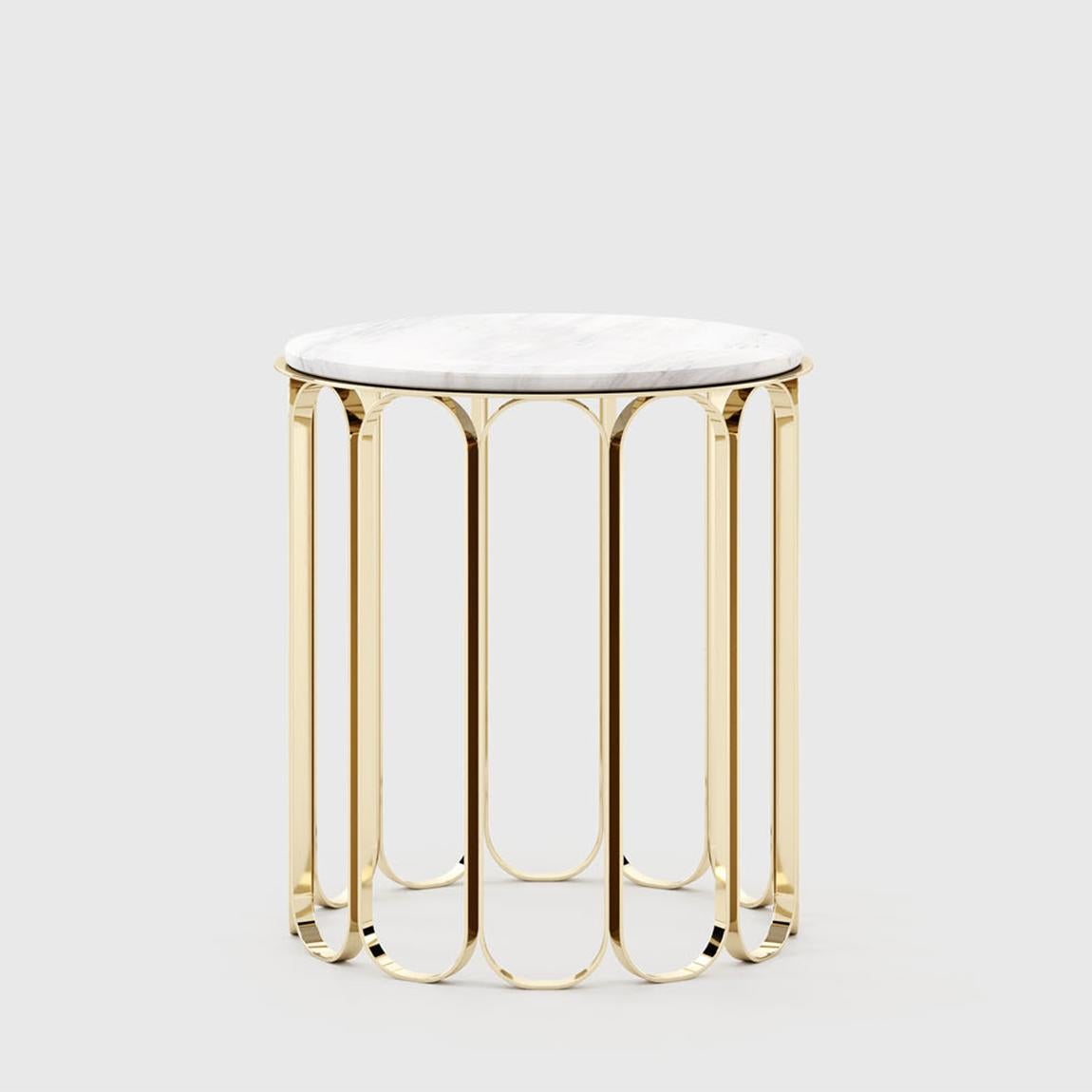 Side table cartouche with polished stainless steel base in
gold finish. With with matte polished white Estremoz marble top.