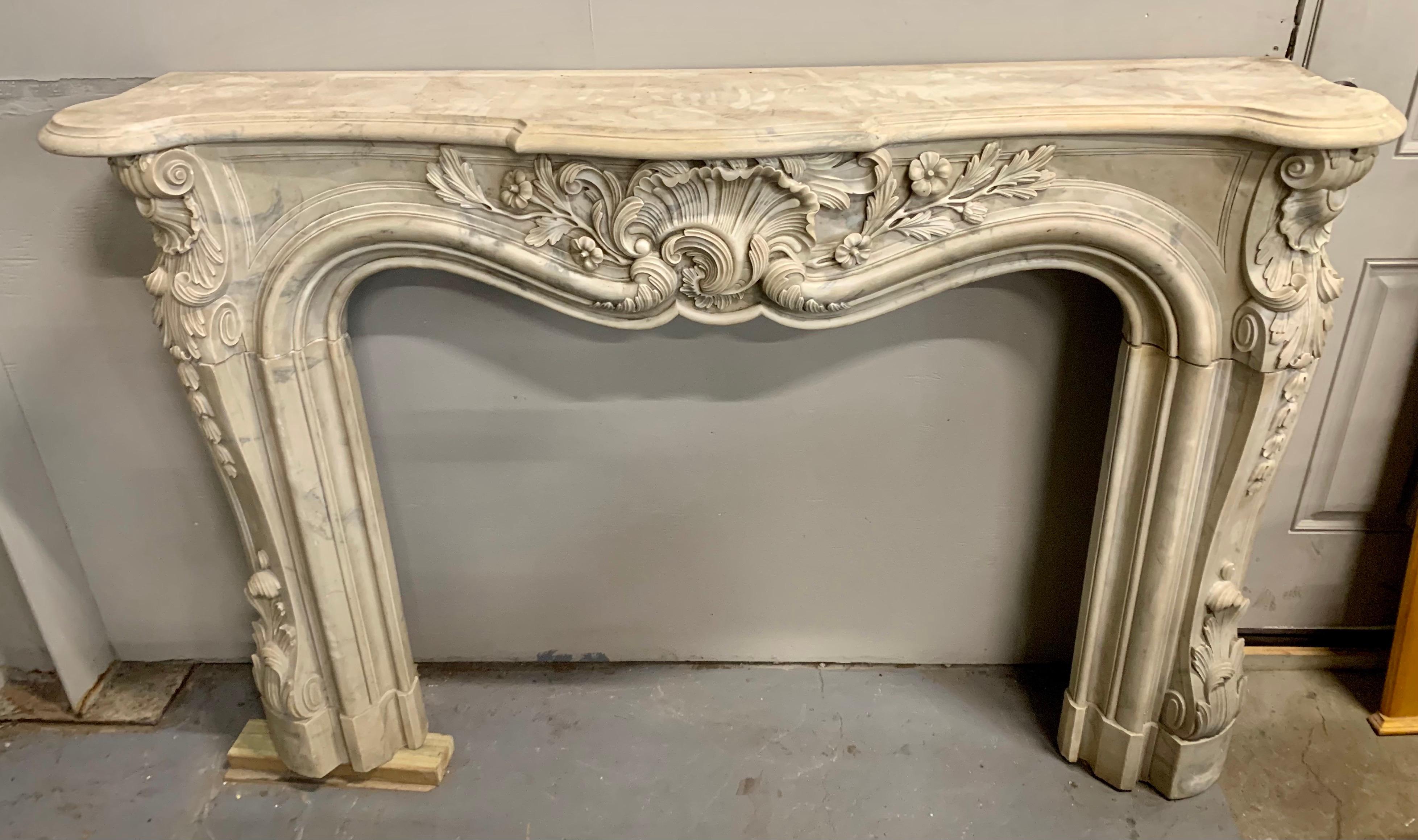 Magnificent French late 19th century marble mantel. Gorgeous lines and better scale.
  