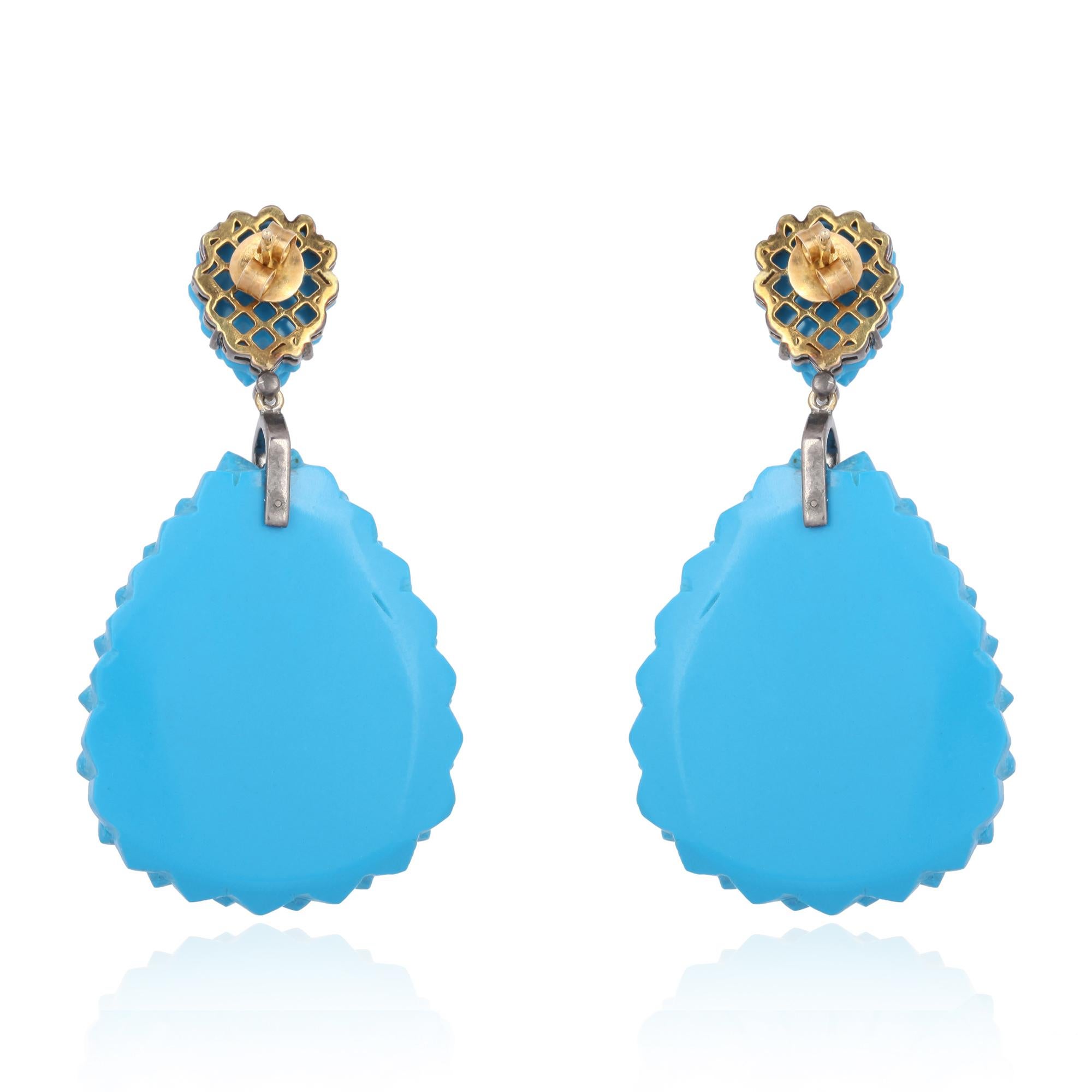 These stunning earrings are thoughtfully and meticulously crafted in 18-karat gold and sterling silver. It is set in 81.34 carats turquoise, emerald and .44 carats of diamonds. 

FOLLOW  MEGHNA JEWELS storefront to view the latest collection &