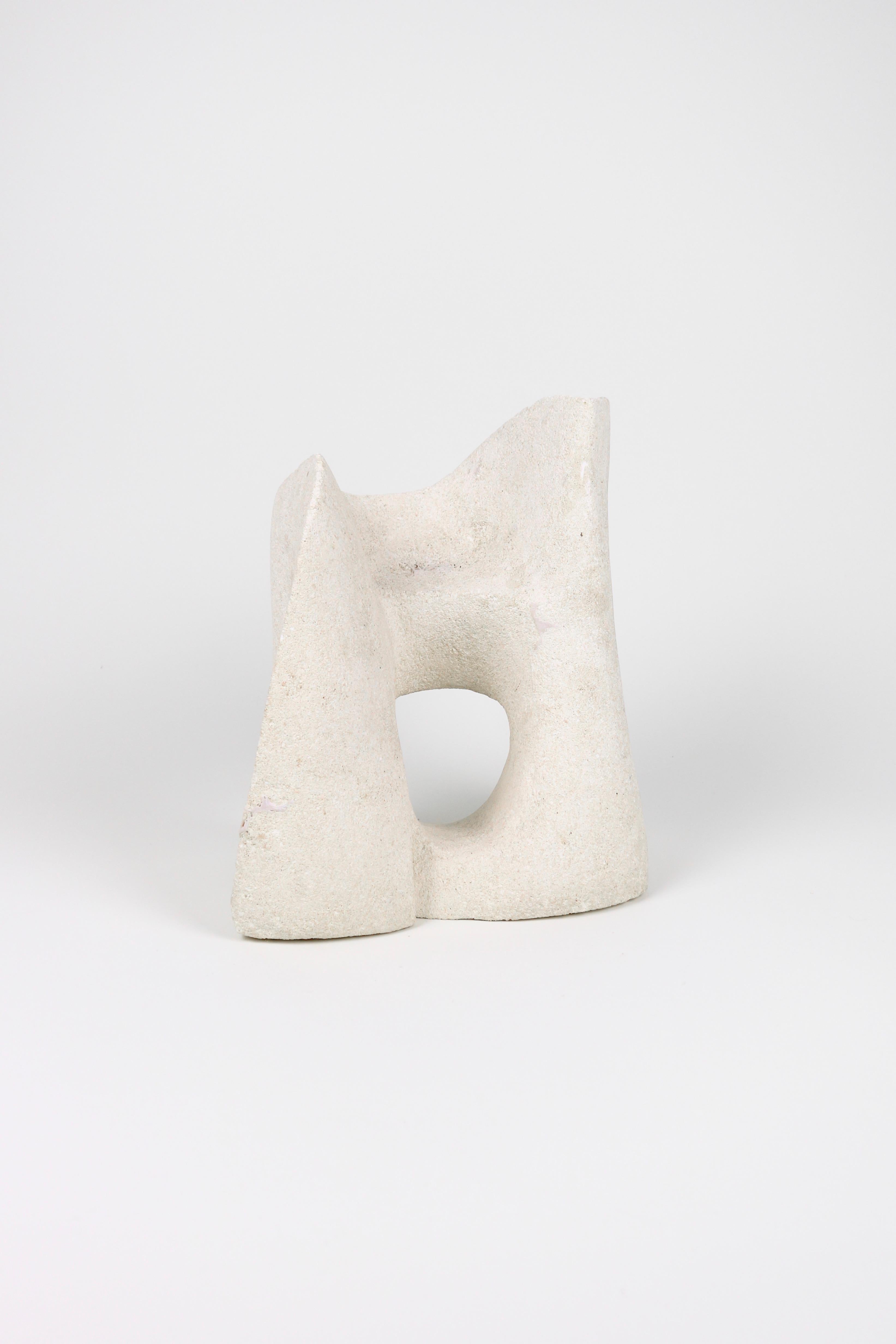 A lightweight concrete sculpture with an abstract form.

Made by an unknown Dutch artist.