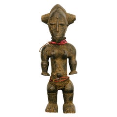 Carved African Baule Style Female Figure Sculpture