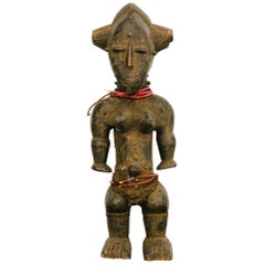 Carved African Baule Style Female Figure Sculpture