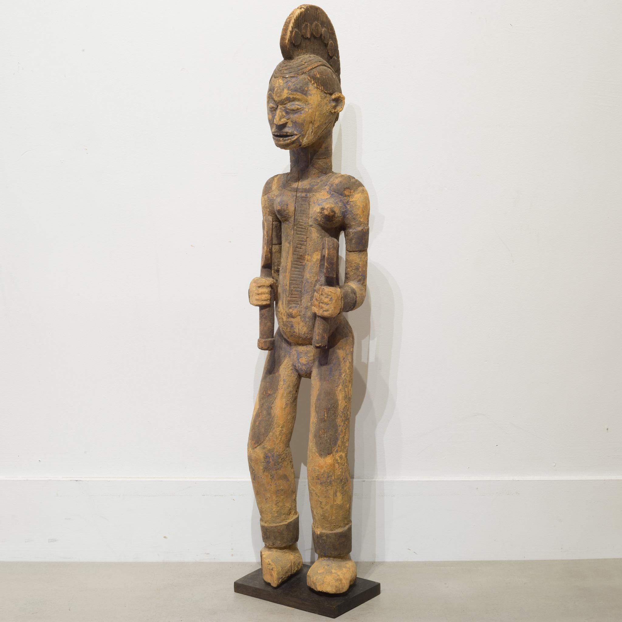About:

A carved wooden figure from the Igbo Tribe of Nigeria holding two objects.

Creator: Igbo Tribe, Nigeria, Africa.
Date of manufacture: Unknown.
Materials and techniques: Carved wood.
Condition: good. Wear consistent with age and