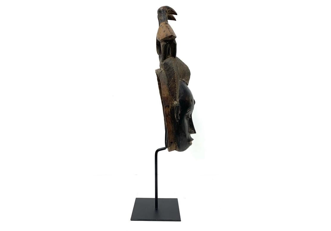 Hand-Carved Carved Africian Wood Ceremonial Mask On Custom Stand For Sale