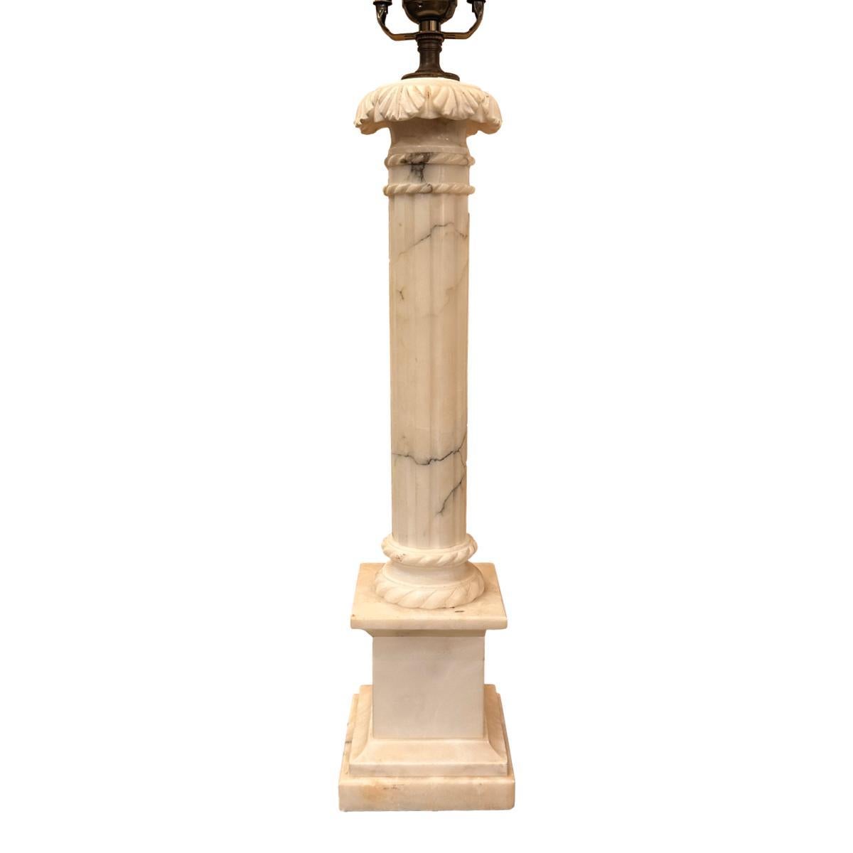 A circa 1940's Italian carved alabaster table lamp in the form of a column.

Measurements:
Height of body: 20