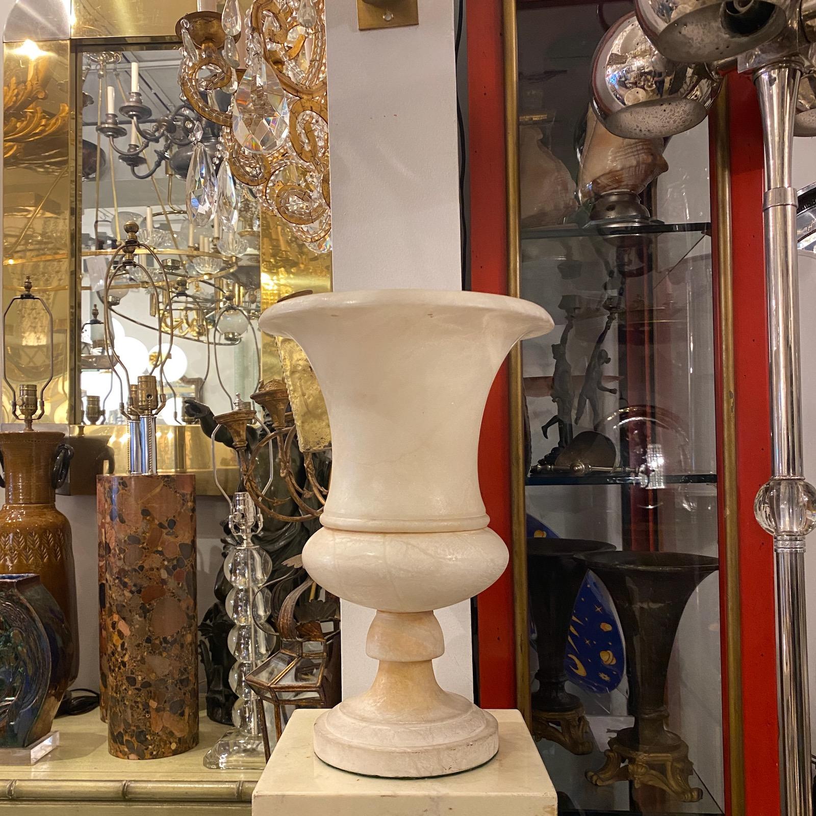 A circa 1920’s Italian carved alabaster urn with interior light.

Measurements:
Height 13.5?
Diameter 9.5?.