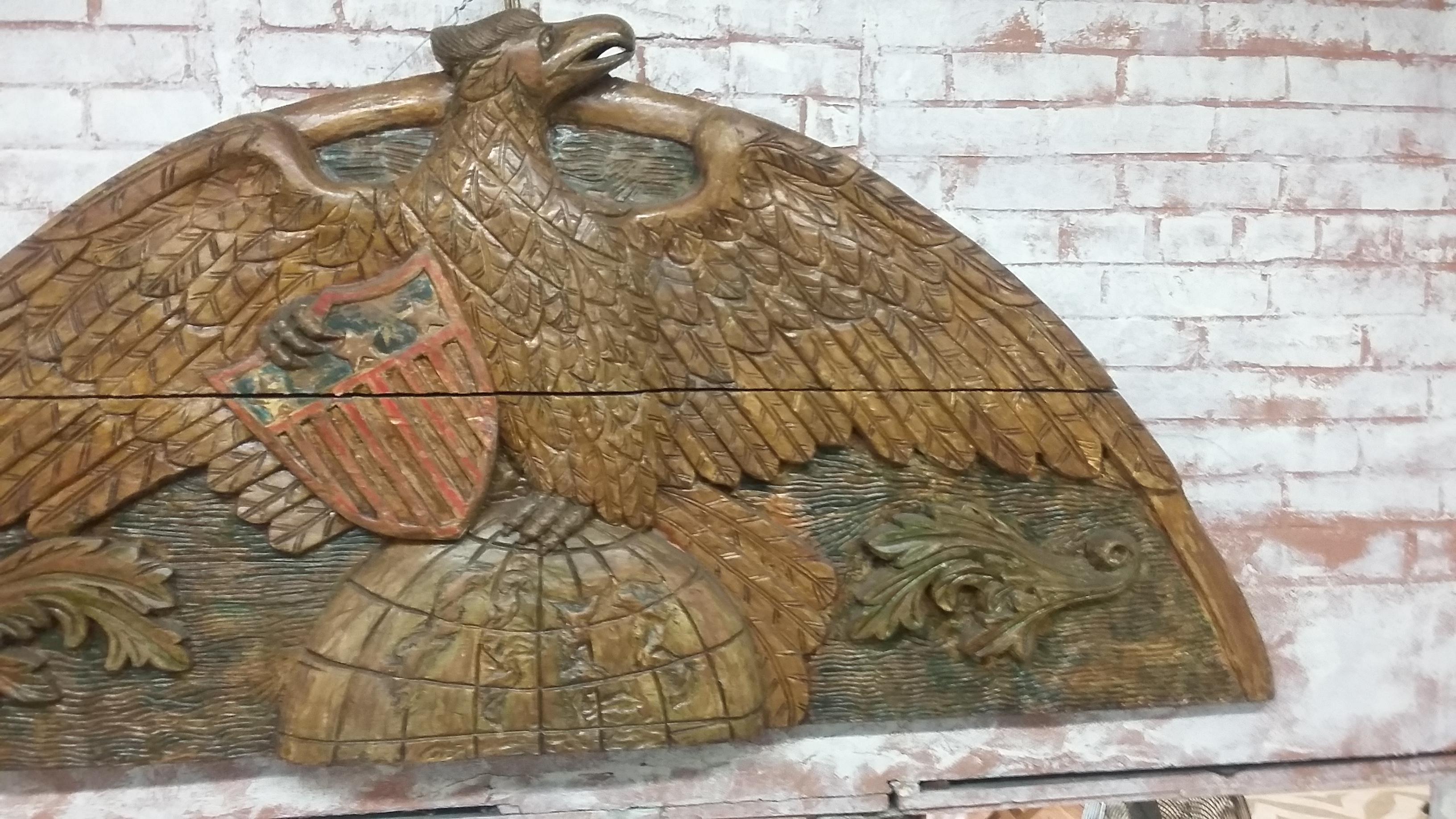 20th Century Vintage Carved American Eagle Sitting atop World Plague 
