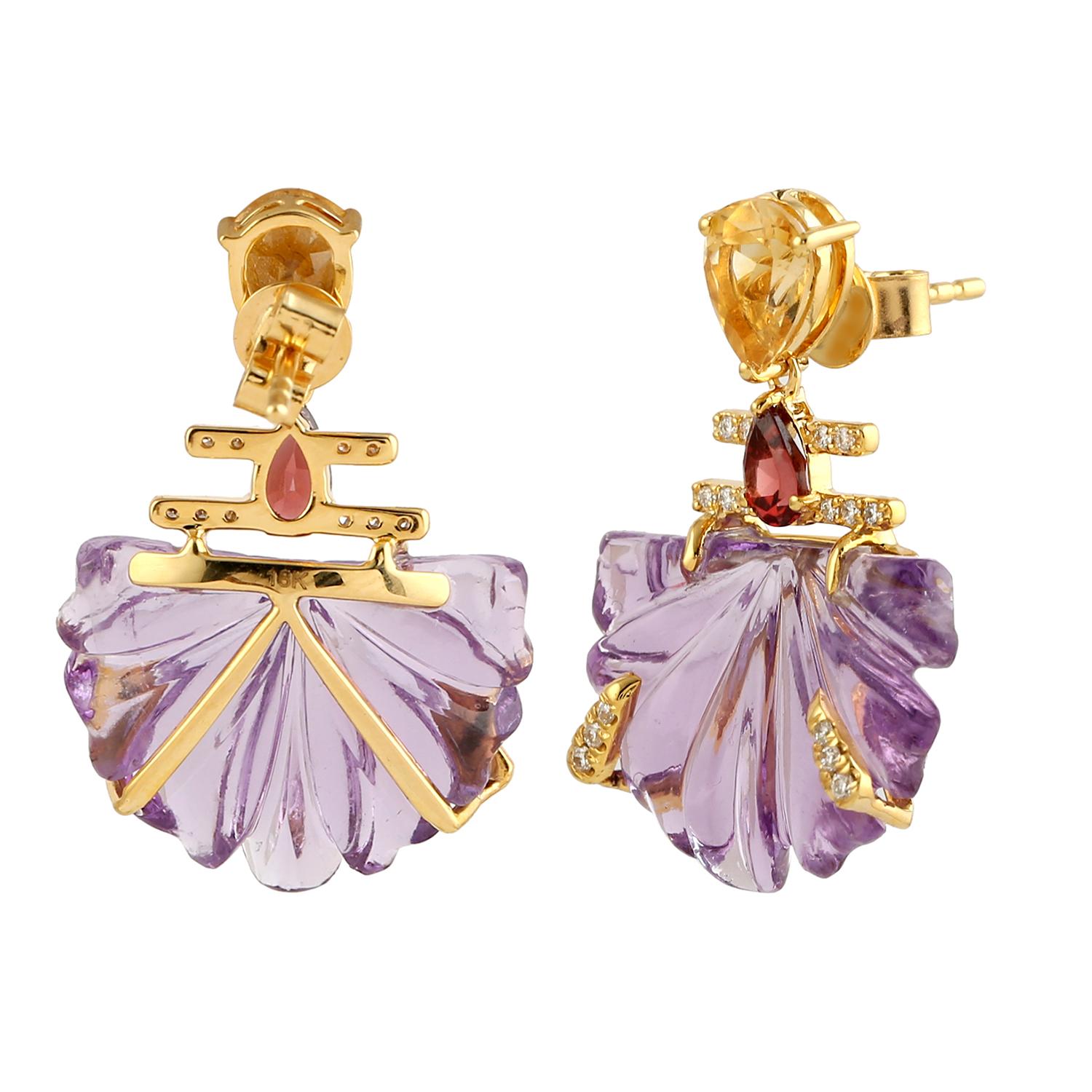 Cast in 14-karat gold. These beautiful earrings are set with carved multi gemstone, amethyst, citrine, rhodolite and .16 carats of sparkling diamonds. 

FOLLOW  MEGHNA JEWELS storefront to view the latest collection & exclusive pieces.  Meghna