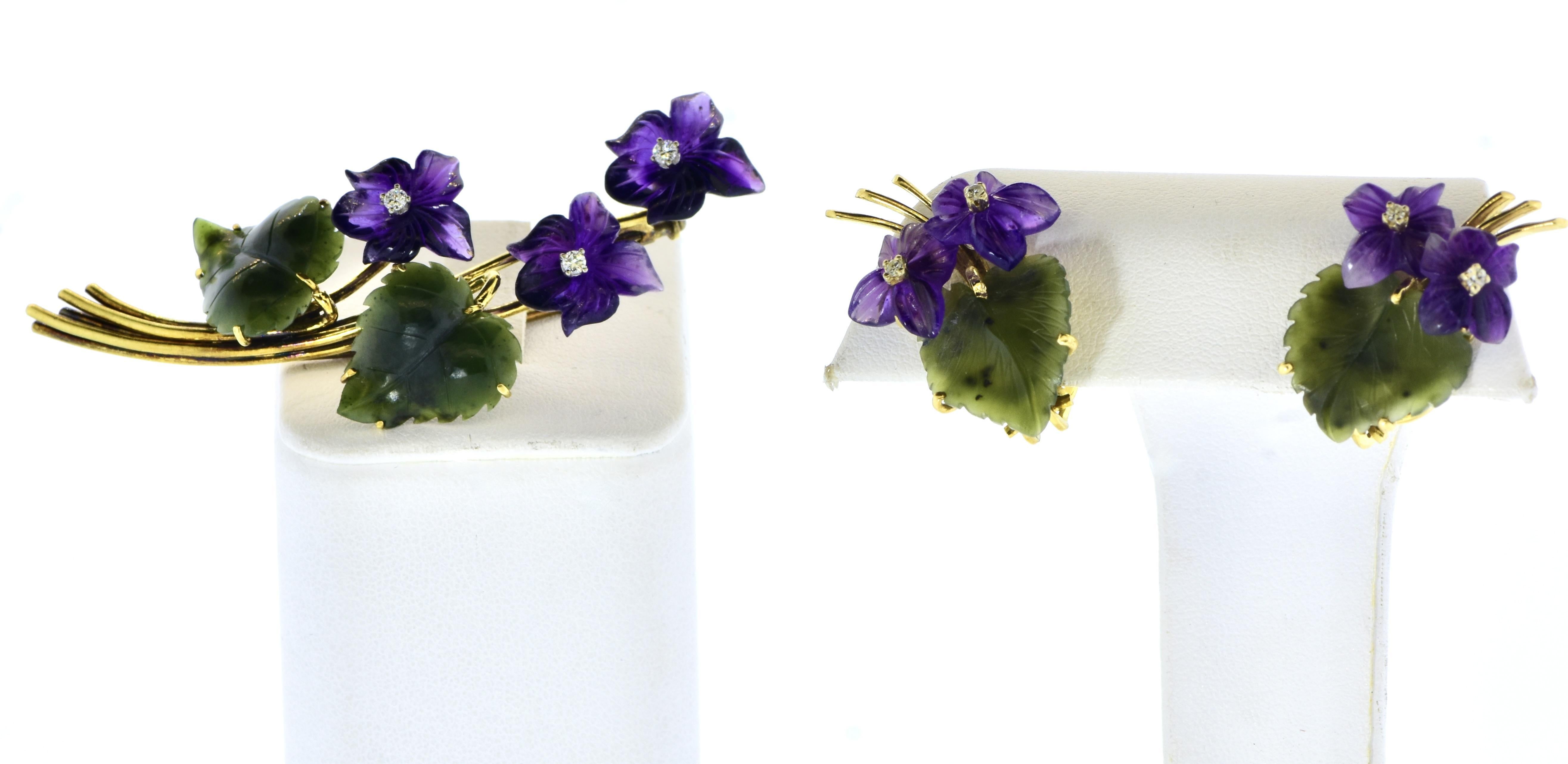 Carved Amethyst, Diamond, Nephrite and Gold Earrings & Brooch Vintage Set, circa 1960.  Small white brilliant cut diamonds are prong set in the center of the carved amethyst flowers.  There are 7 diamonds each weighing approximately .025 to .04