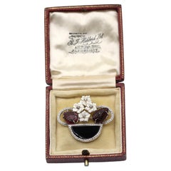 Amatista tallada Diamantes Ónice Nácar Broche Flor Caja de oro de 18 quilates, 1930