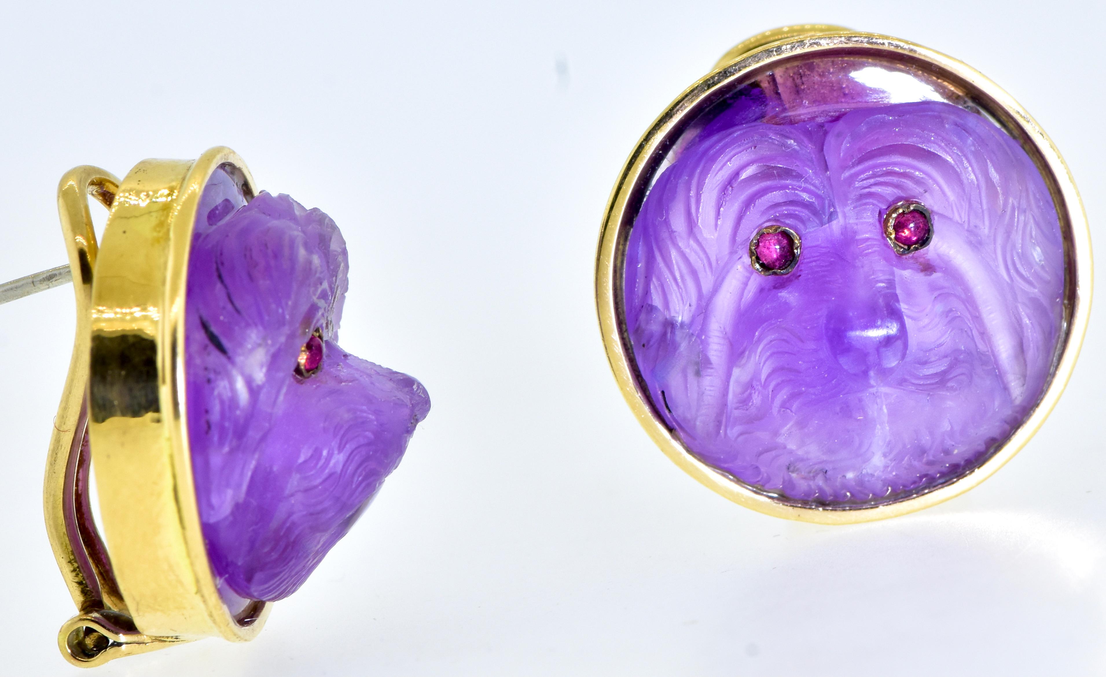 Carved cameo lap dog earrings c. 1900 with more recent gold settings.  Splendid, carved amethyst lap dogs nuzzle your ear lobes as they accompany you through your busy day.  They are each hand cut by a master craftsman.  Notice that each is unique. 
