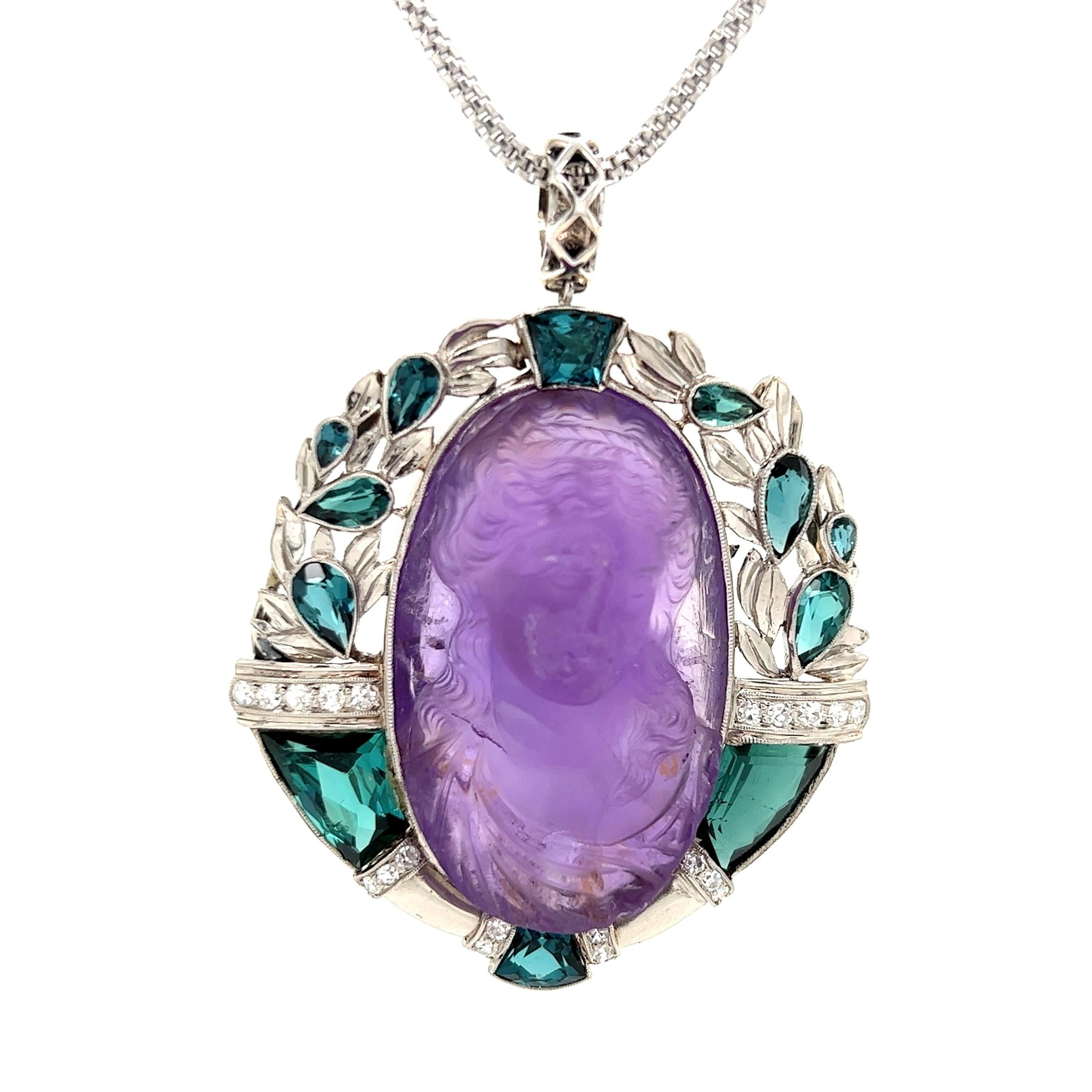 
Simply Beautiful! Captivating Carved Amethyst Medallion Pendant Necklace depicting a Beautiful Young Lady, Hand Carved in High Relief. Rendered with remarkable detail and warmth, so unusual to find! Securely Hand set in an Exquisite Hand crafted