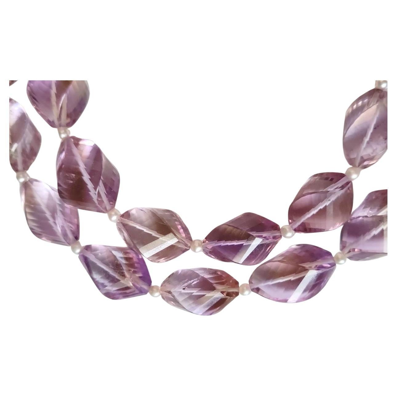 One of the rarest and most beautiful natural gemstones, Ametrine is a uniquely lovely bi-colored combination of Amethyst and Citrine Quartz.
Ametrine, also known as trystine or by its trade name as bolivianite, is a naturally occurring variety of