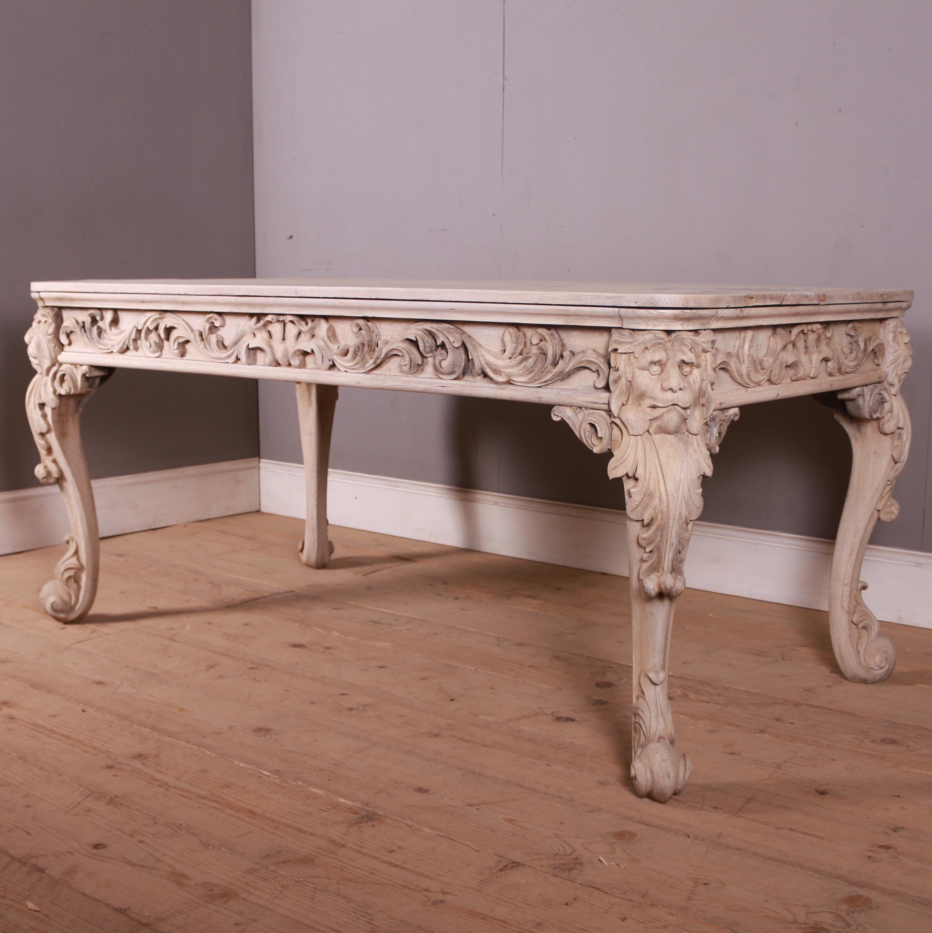 Large 19th C carved and bleached oak desk / centre table. 1880

Clearance is 23.5