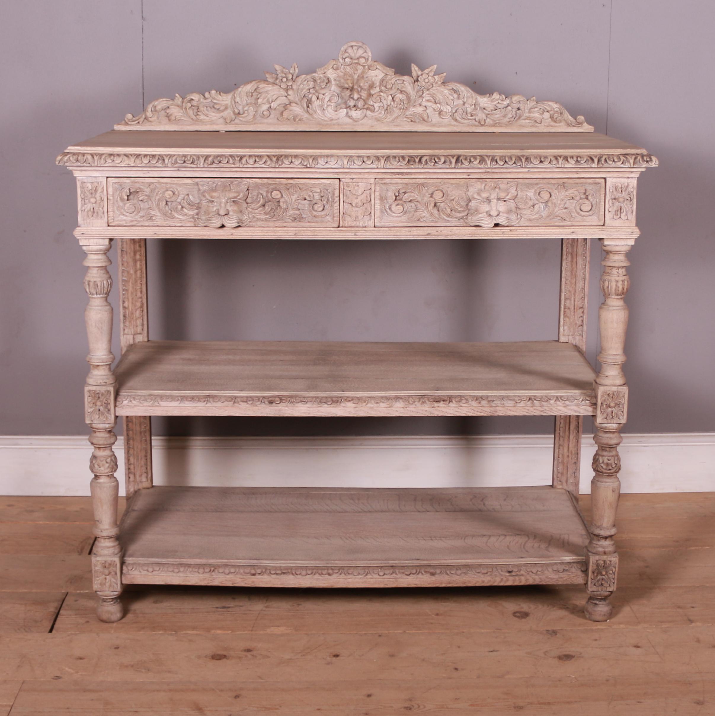 Late 19th C carved and bleached oak English buffet. 1890.

Height to worktop is 40.5