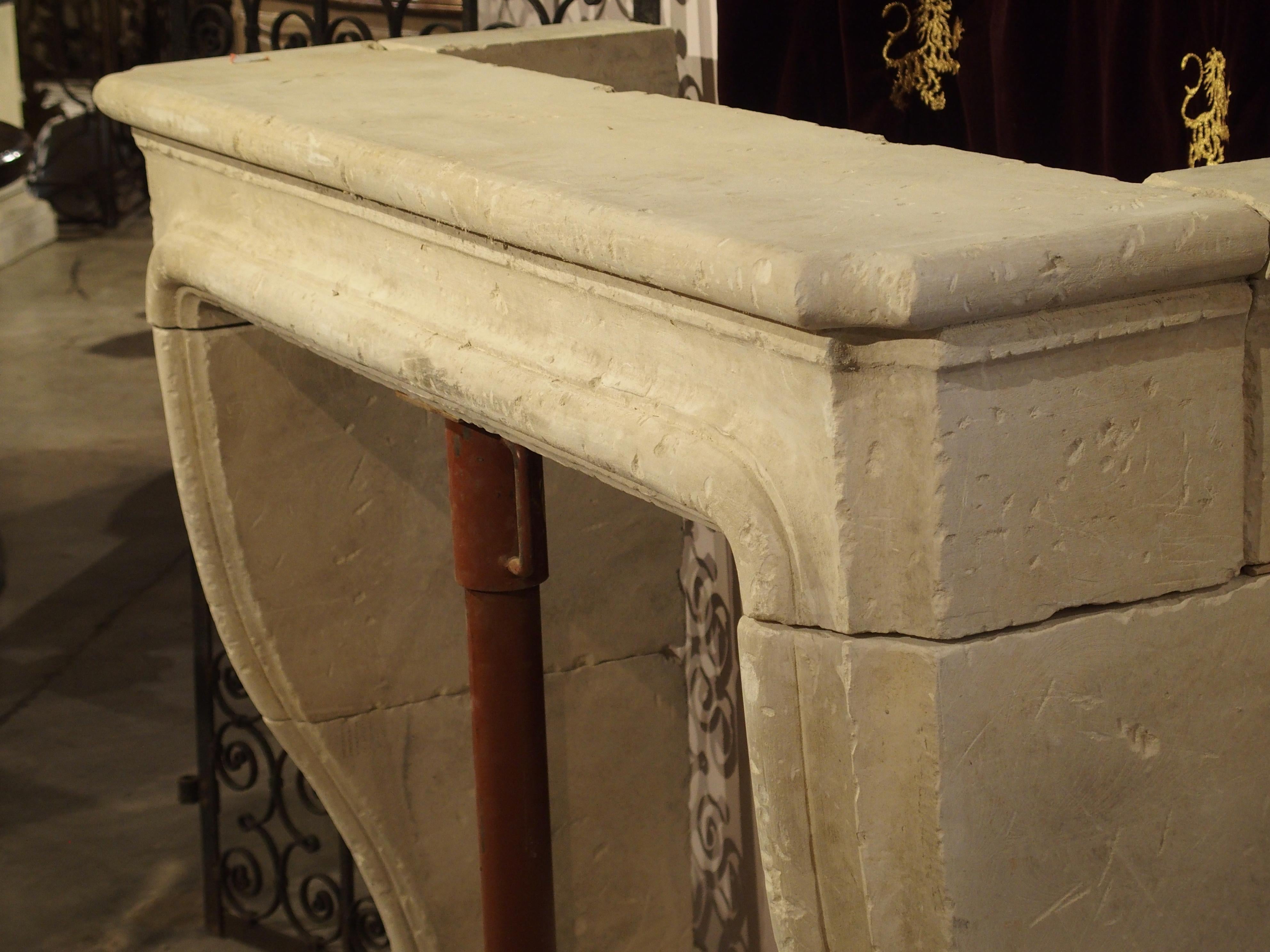 Carved and Distressed Italian Limestone Fireplace Mantel 1